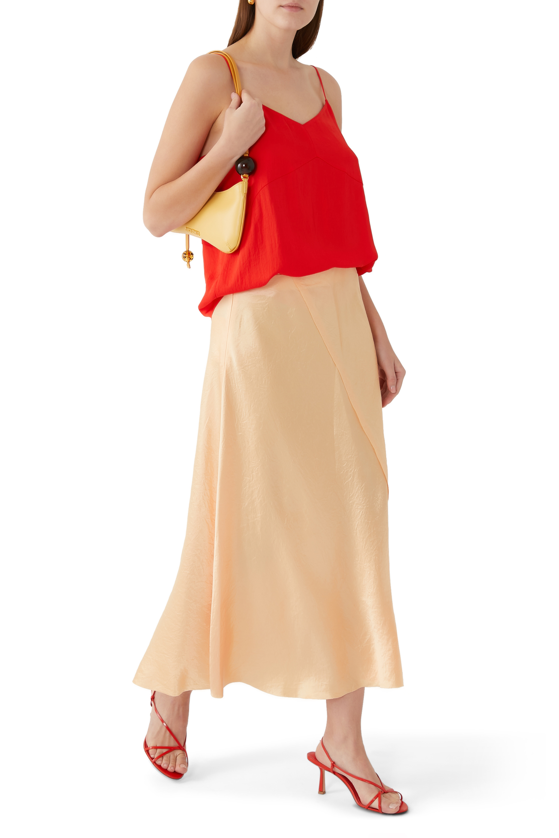 تنورة سهل الإرتداء متوسطة الطول بحافة منسلة وتصميم مقسم بأجزاء