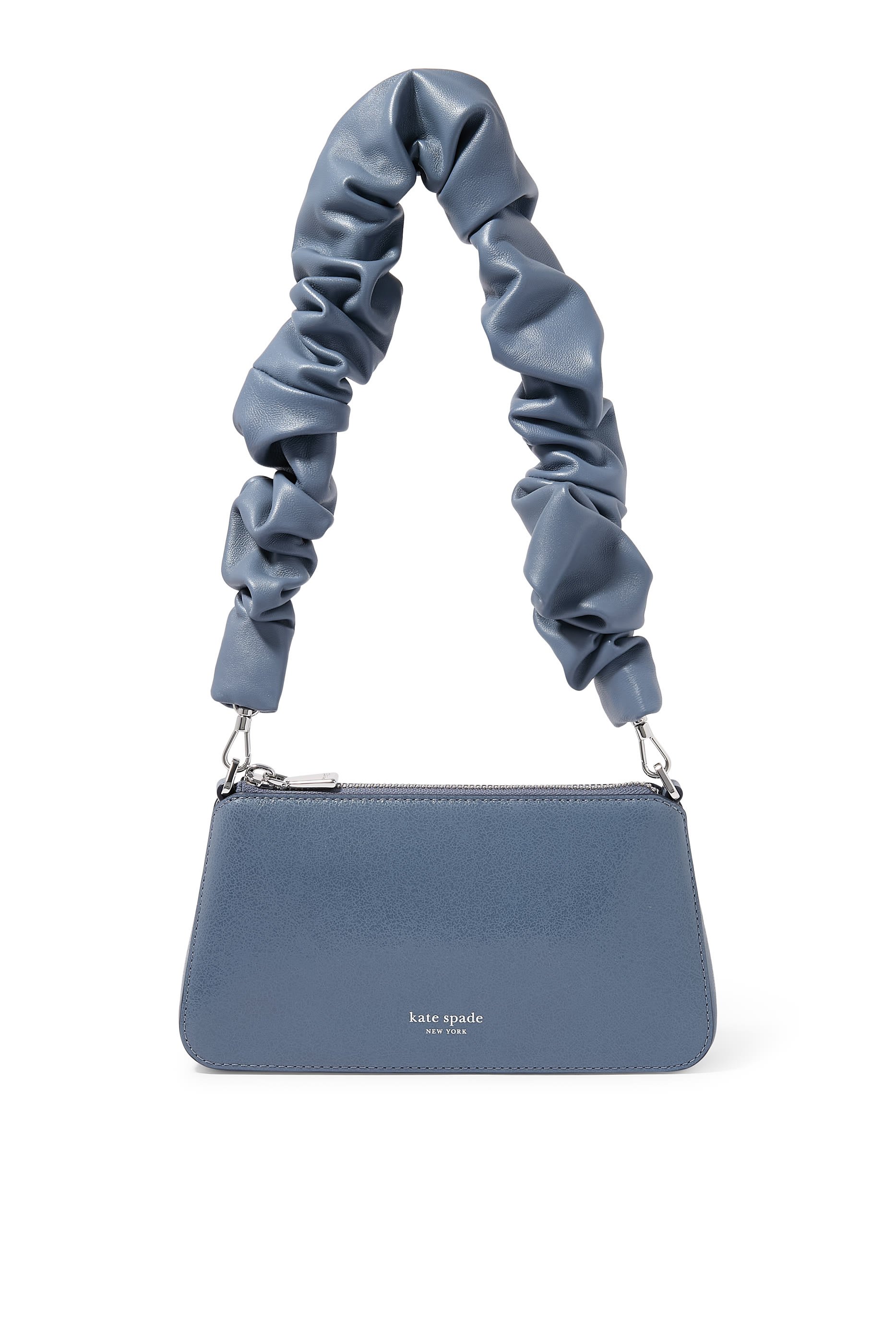 حقيبة بشعار الماركة جلد