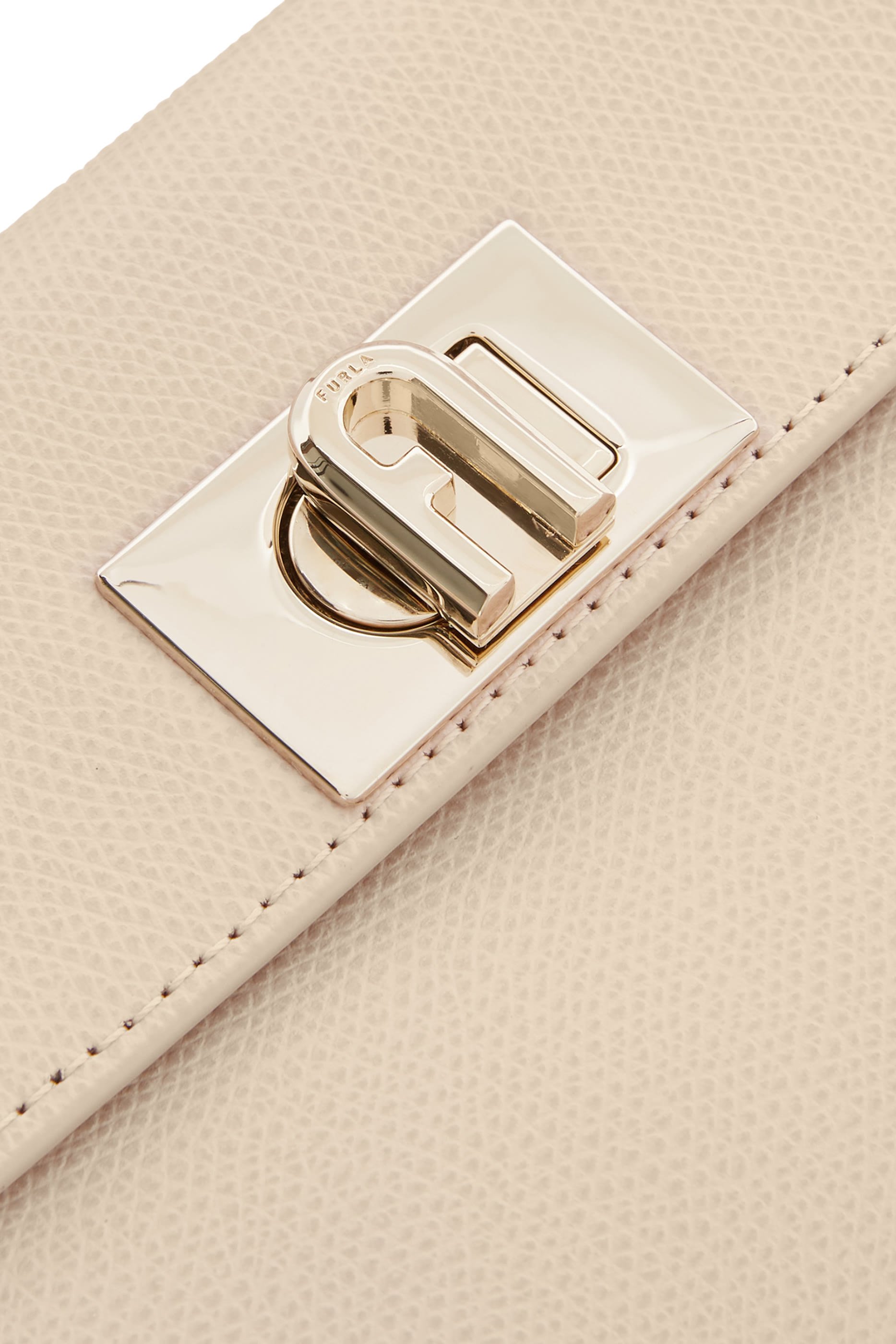 حقيبة يد صغيرة جلد