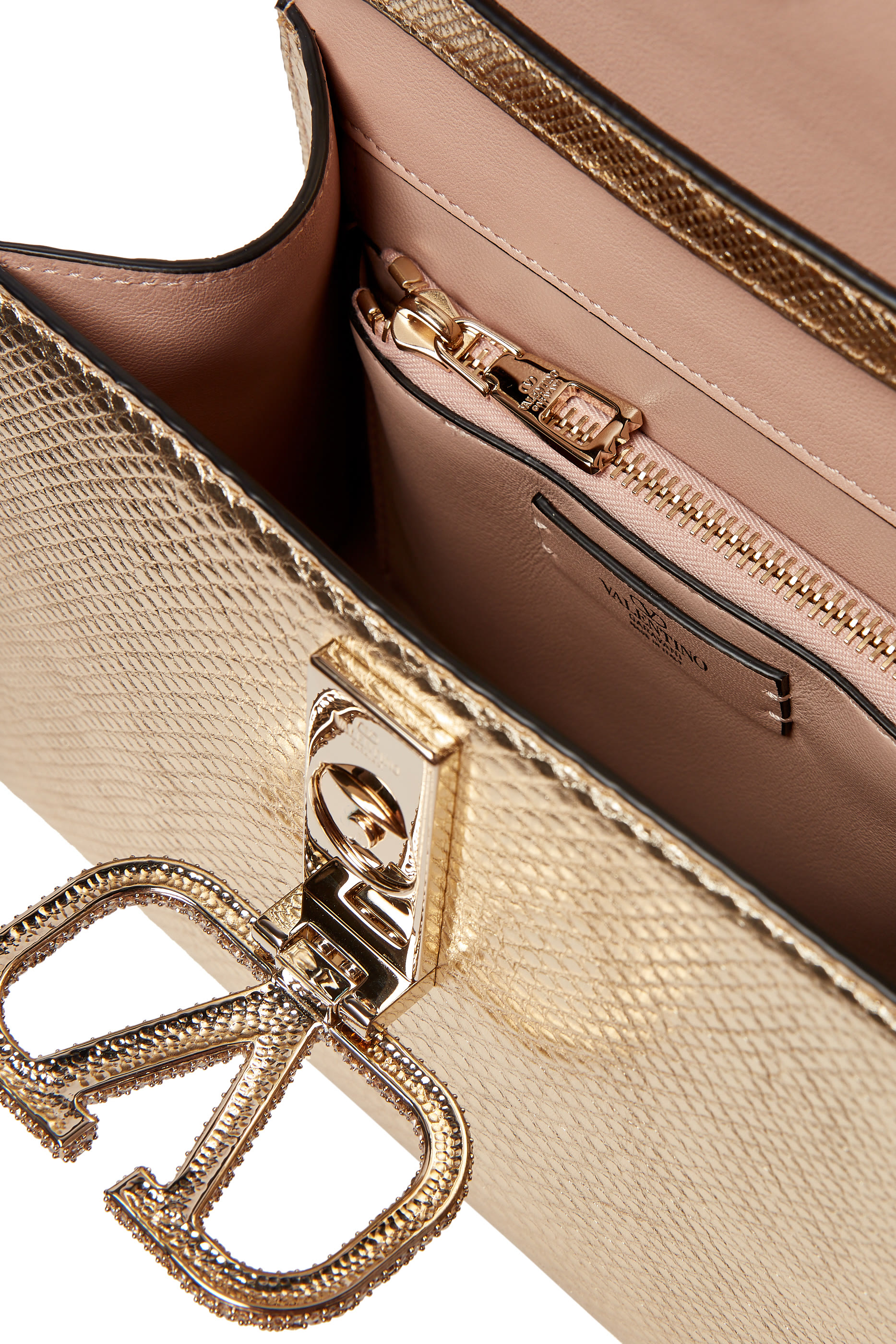 حقيبة بيد علوية بشعار الماركة