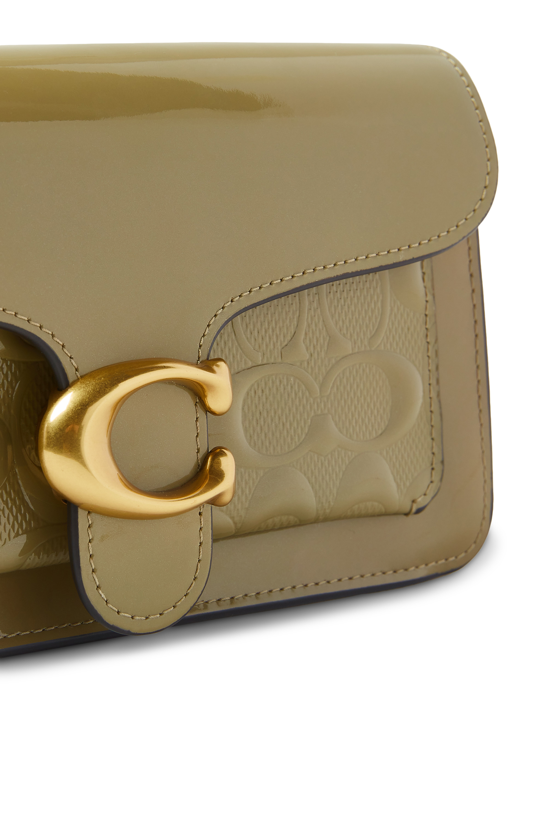 كلاتش تابي جلد لامع بنقشة شعار الماركة