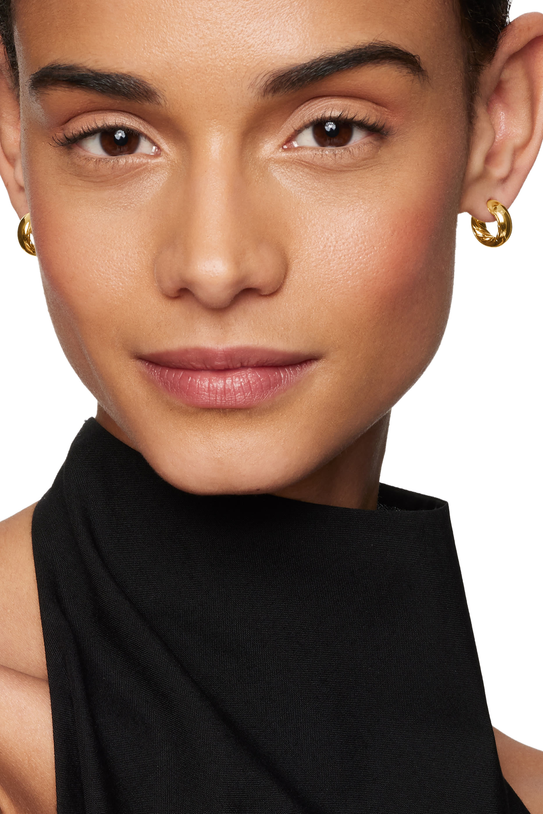 أقراط سكلبتد كابل دائرية ذهب أصفر عيار 18