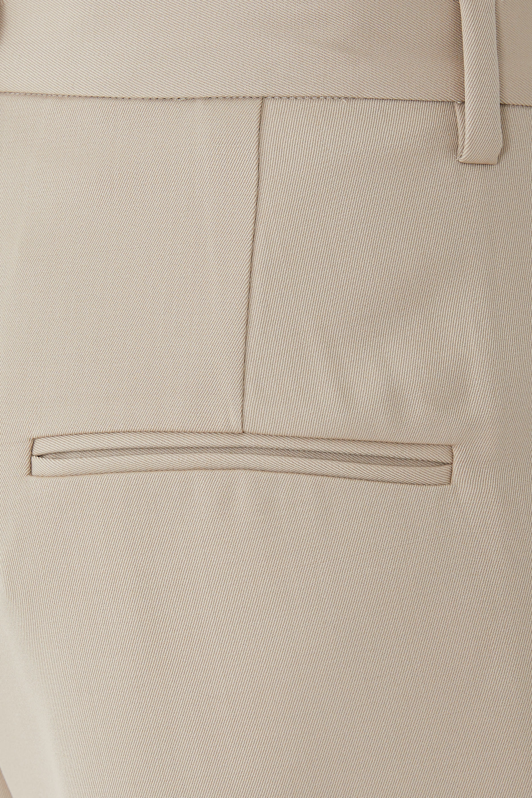 بنطال كاري بقصة ساق واسعة وخصر مرتفع