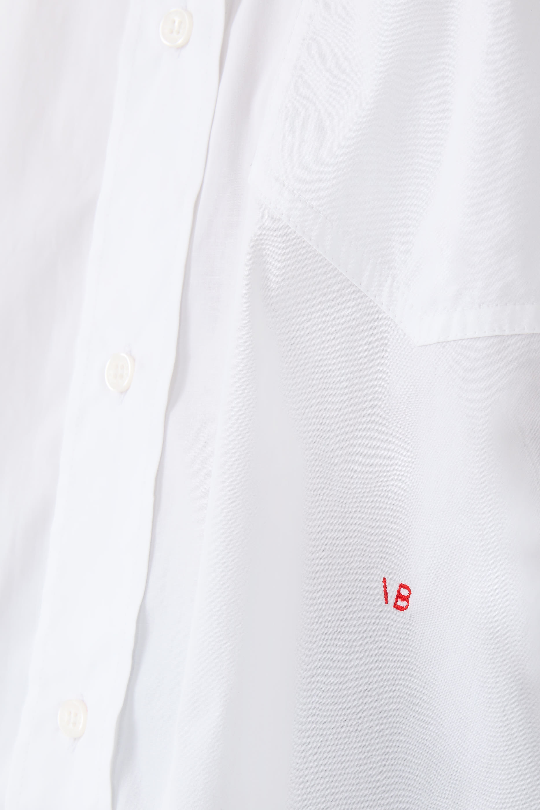 قميص قصير بأكمام طويلة