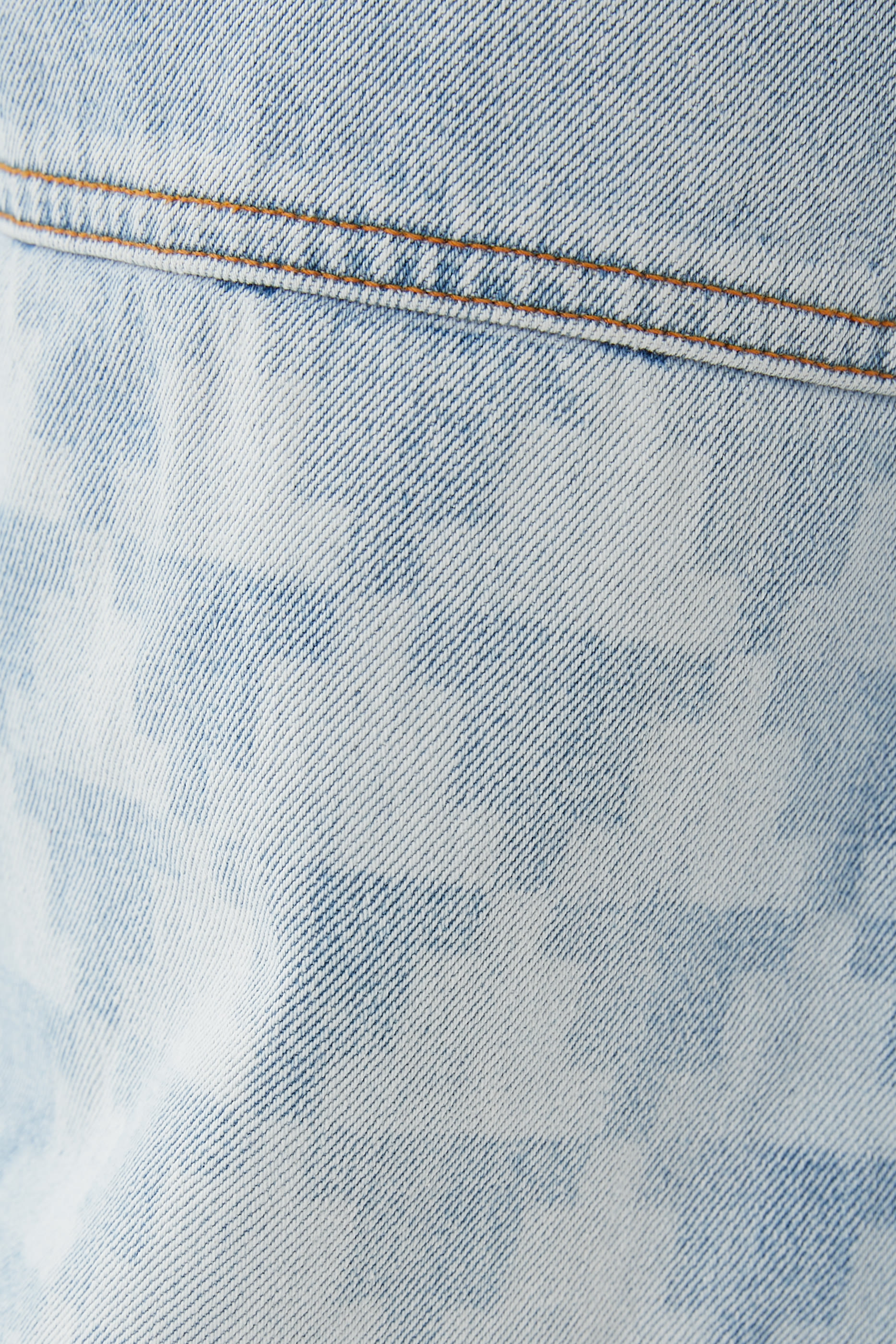 بنطال دنيم بتصميم متقاطع بليزر وقصة مستقيمة