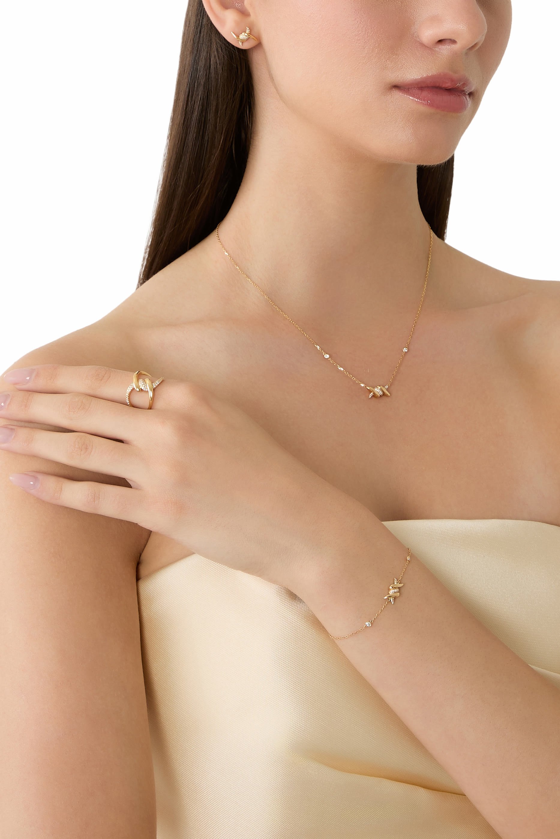 خاتم باربيليه بتصميم ملفوف مرصع بالماس، ذهب أصفر عيار 18