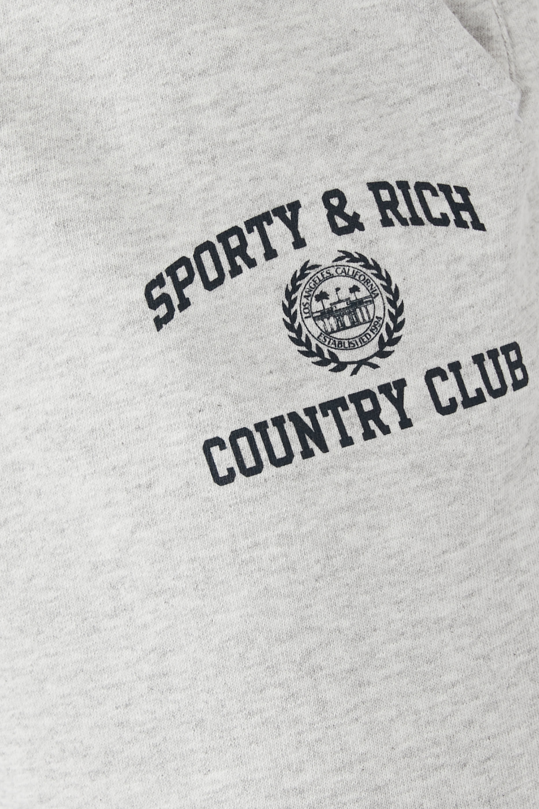 بنطال رياضي بنقشة بتصميم جامعي