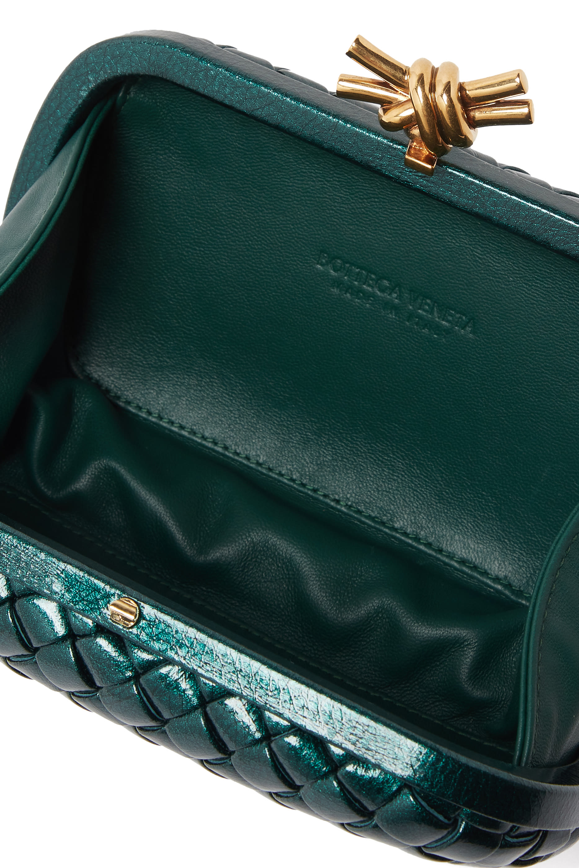 كلاتش بحلية بتصميم عقدة