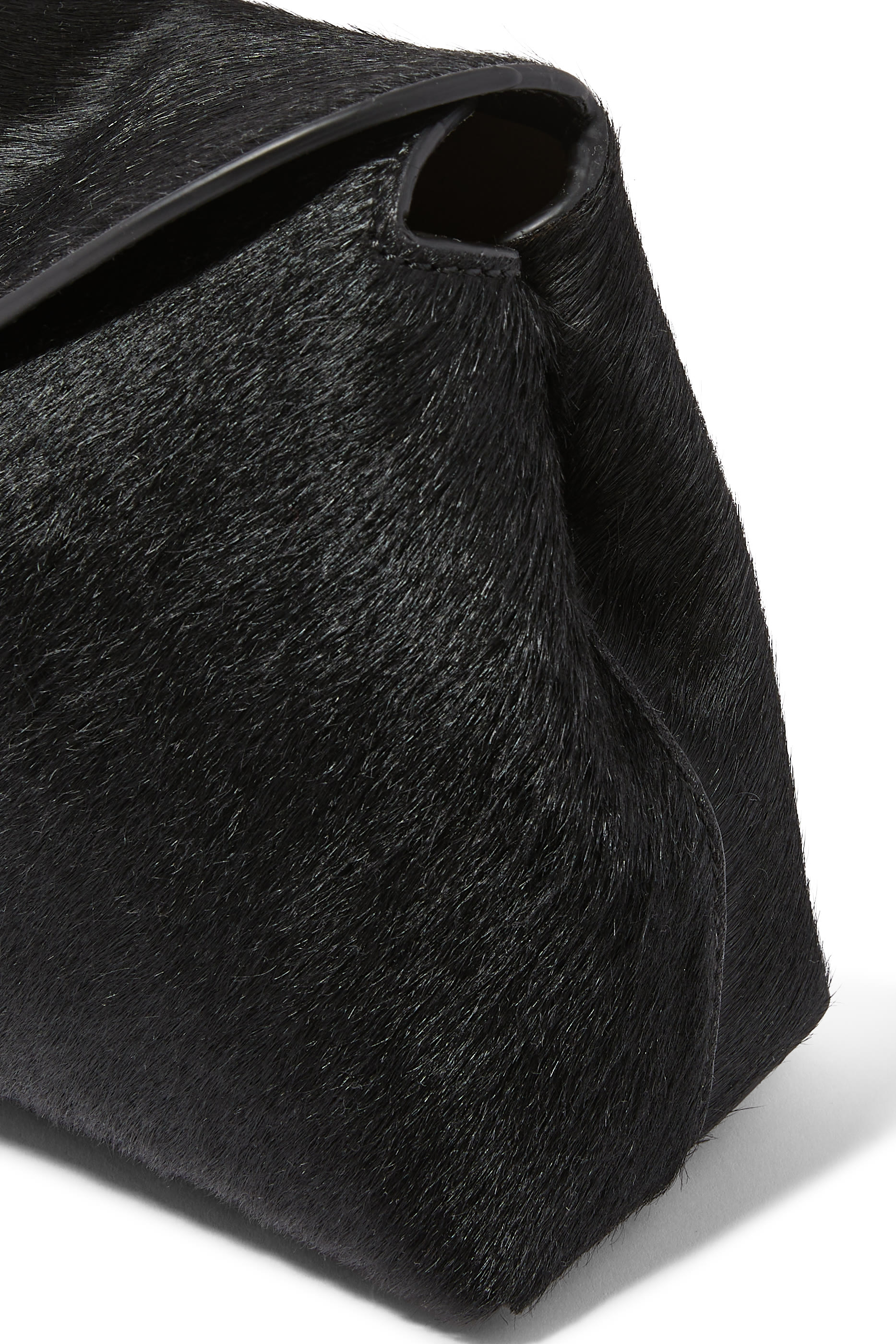 حقيبة كلاتش بقفل على شكل حرف T فرو مهر