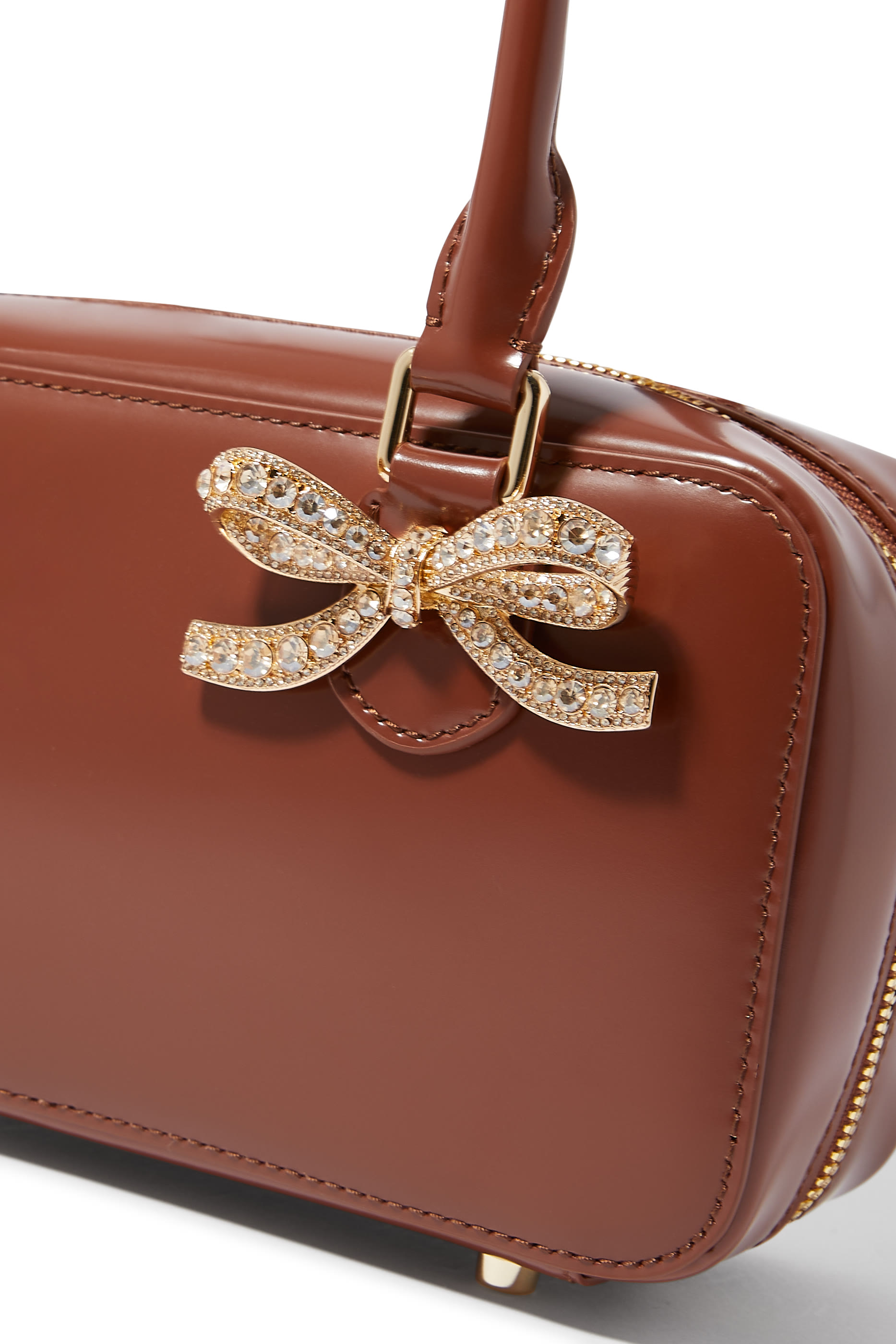 حقيبة يد صغيرة جلد