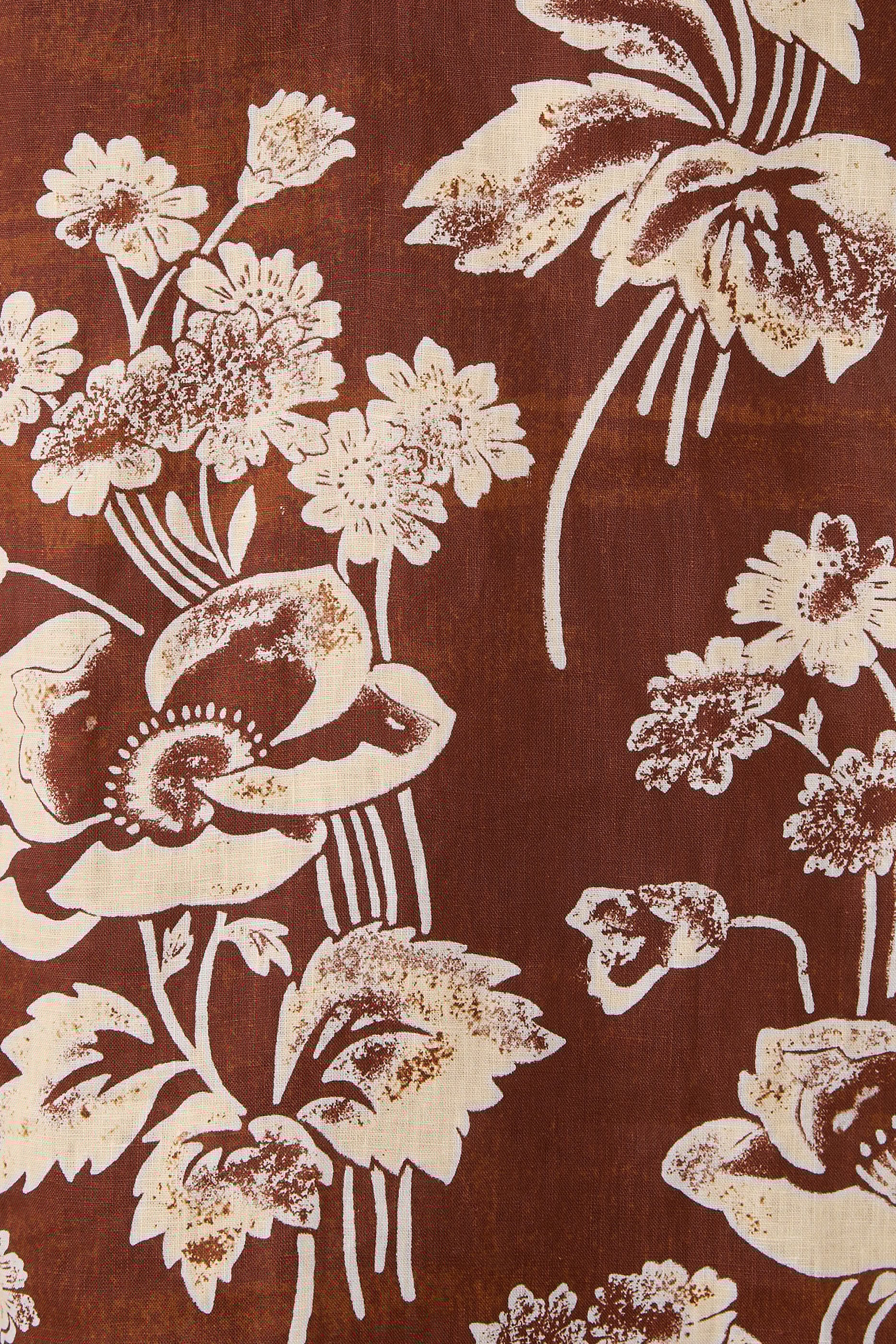 قميص بنقشة فاوانيا ورباط أمامي