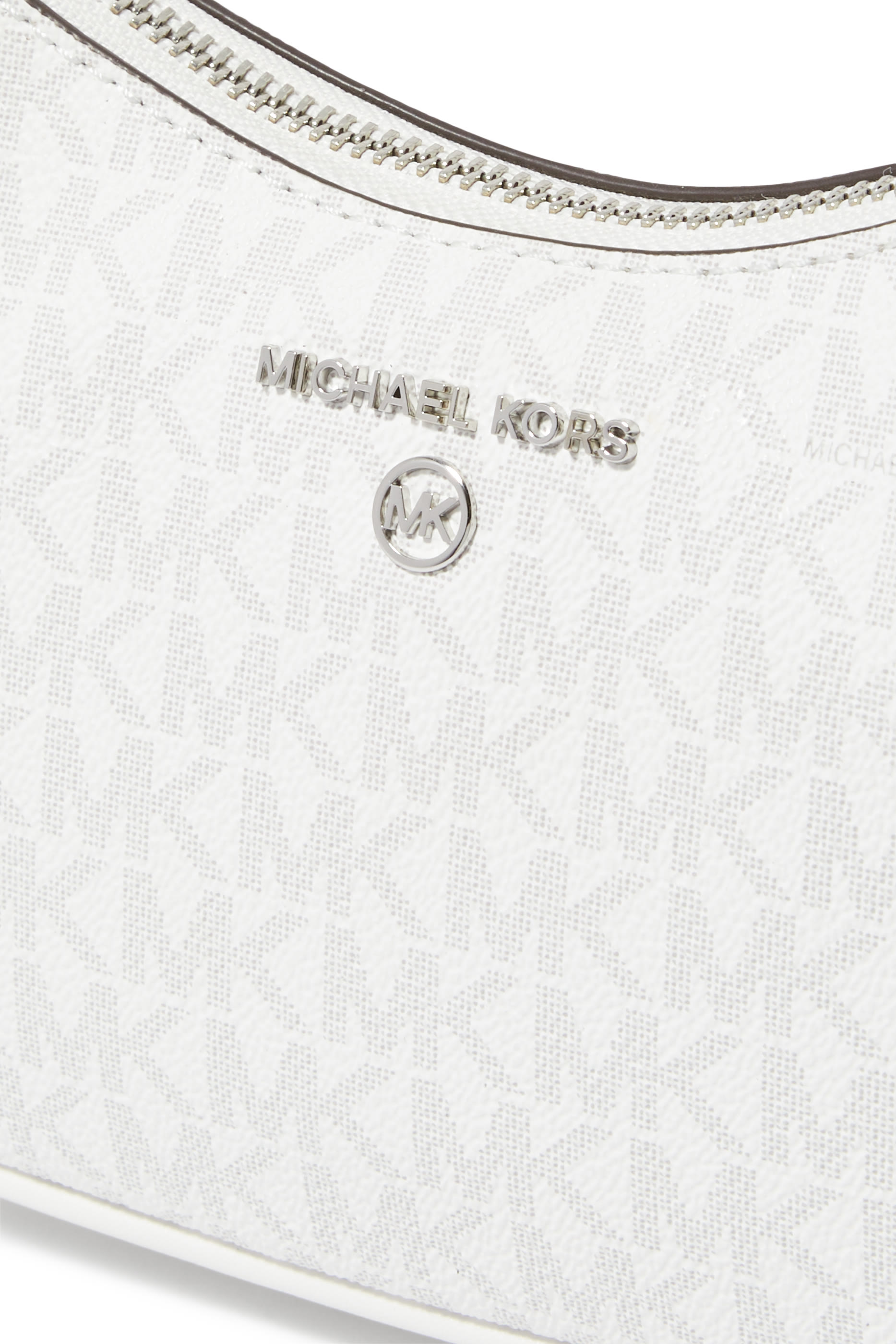 حقيبة جت ست صغيرة بحلية شعار الماركة