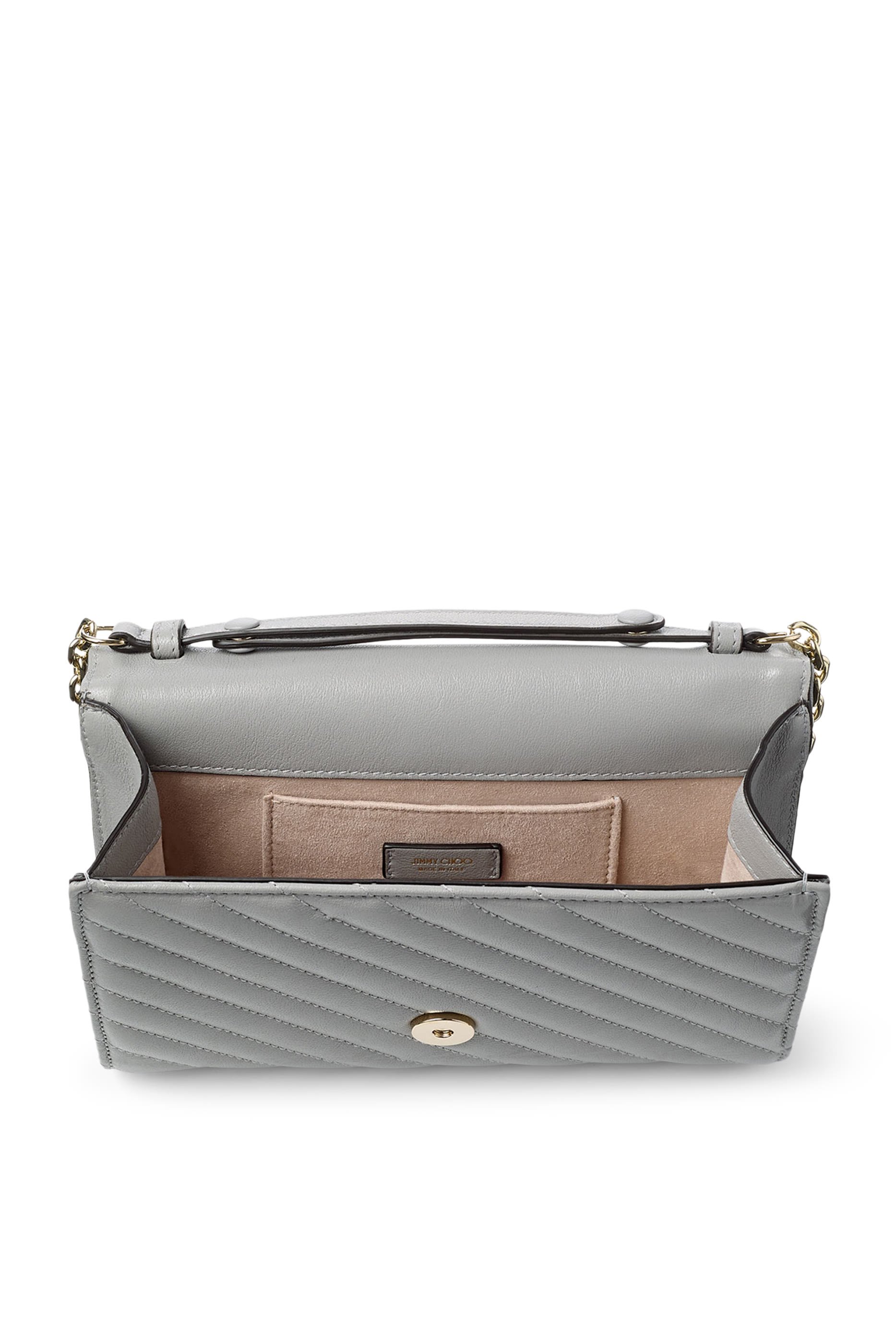 كلاتش بحافة مقوسة وحمالة سلسلة جلد