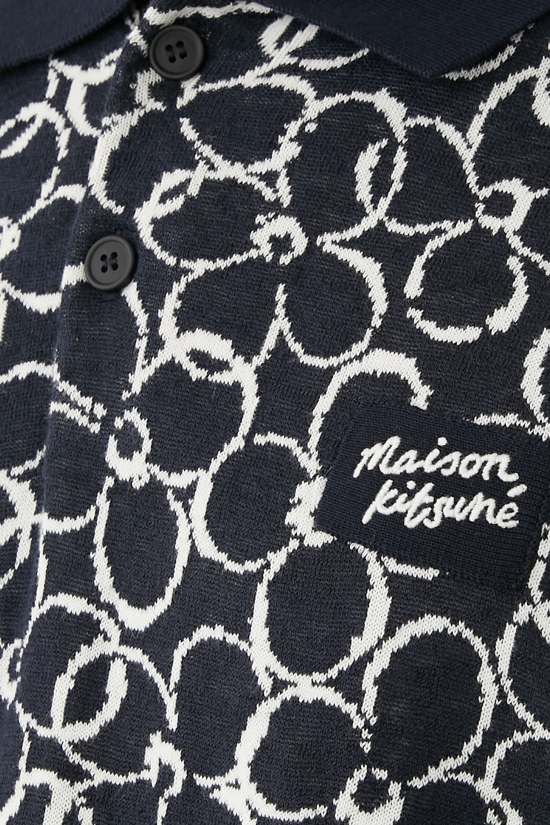 قميص بولو بنقشة زهور أقحوان تجريدية جاكار