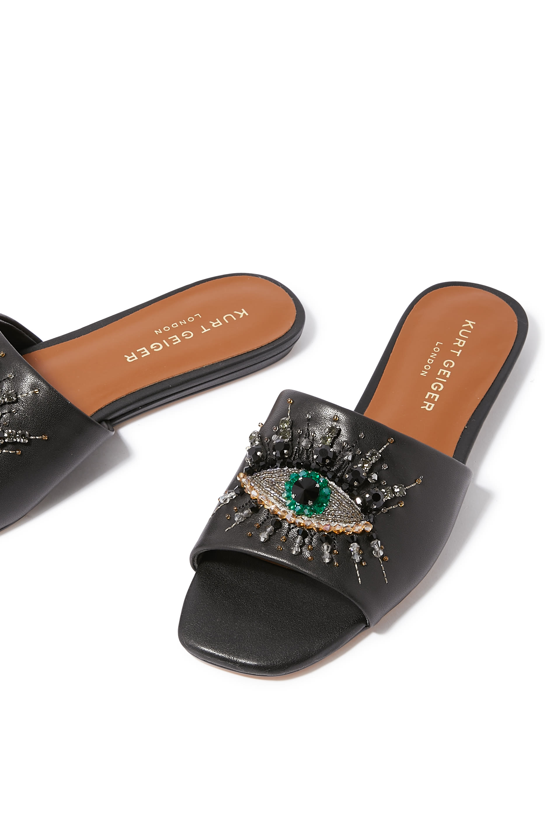 صندل بنعل مسطح جلد بنقشة عين