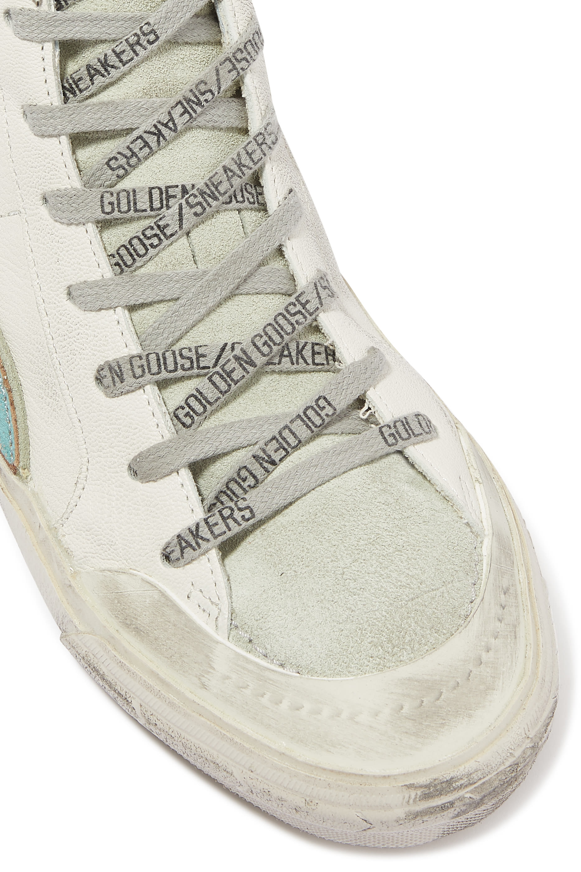 سنيكرز سلايد بنجمة بطبعة جلد الفهد وفلاش جلد أزرق