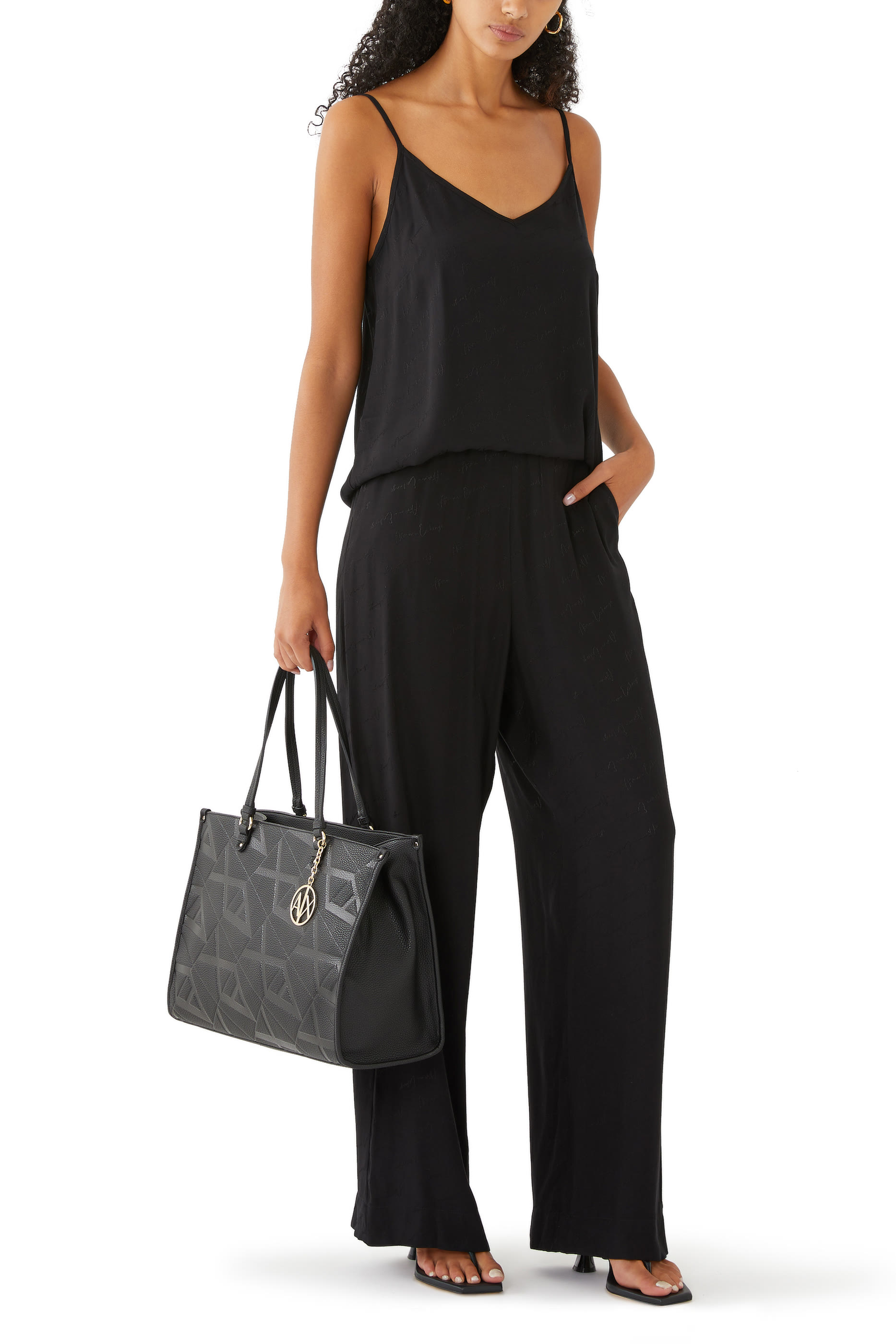 بلوزة بلا أكمام بياقة على شكل حرف V