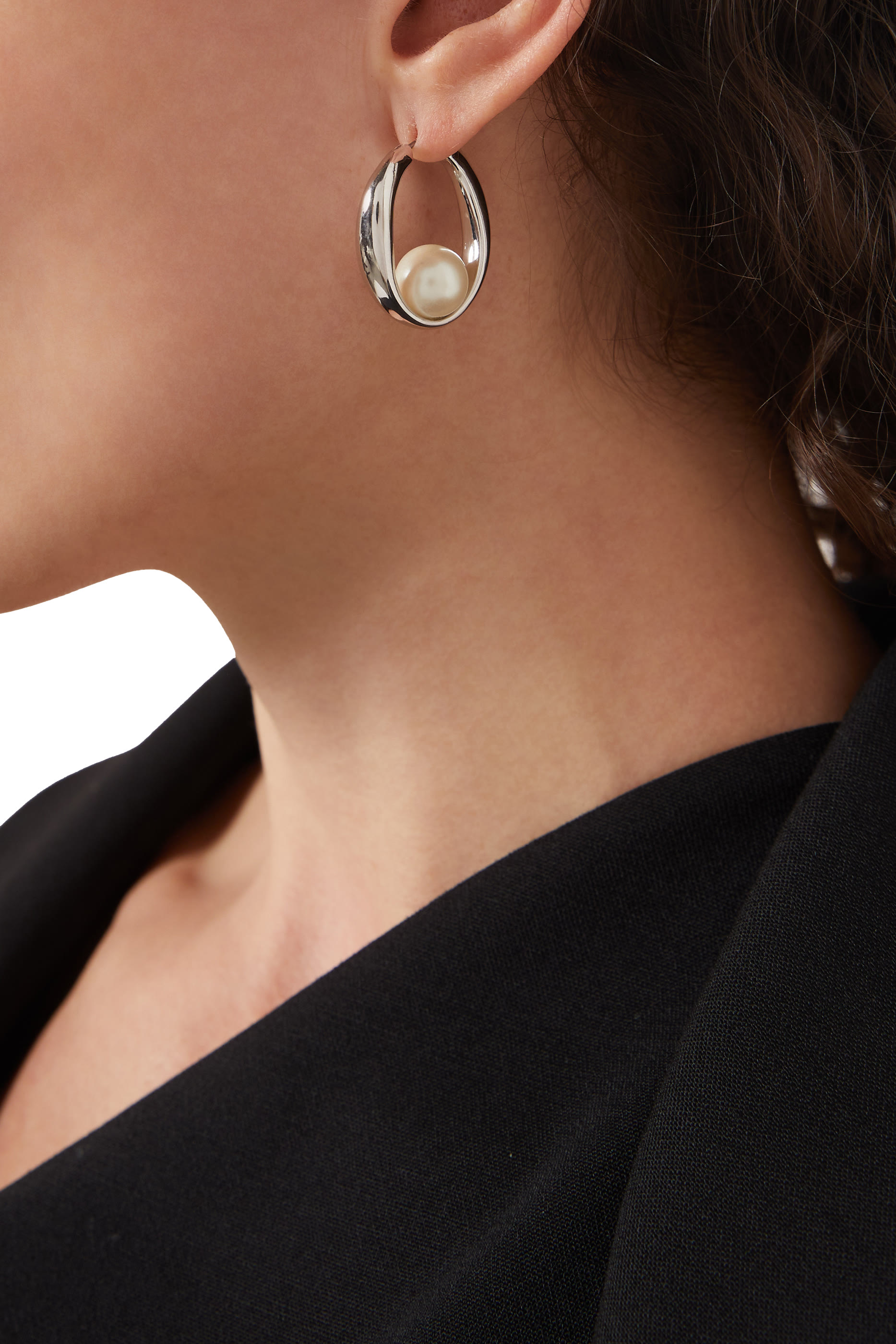 أقراط دائرية هارموني زجاج وتيتانيوم