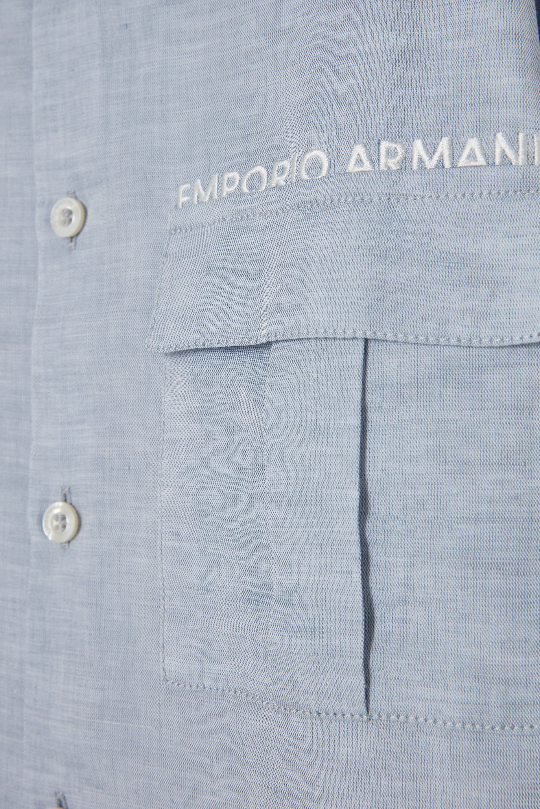 قميص بشعار الماركة المطرز عندالجيب للأطفال