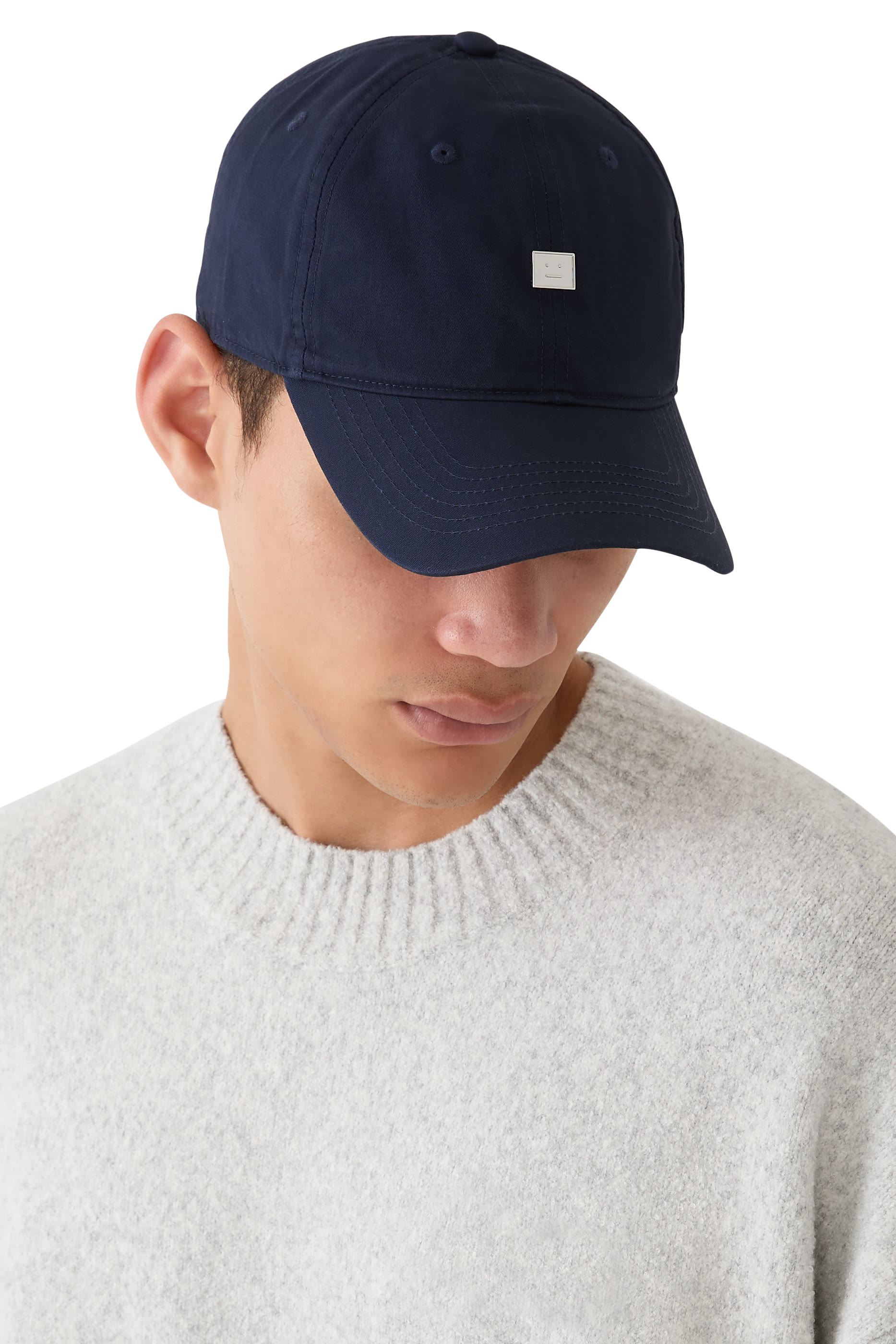 كاب بحلية بطبعة وجه