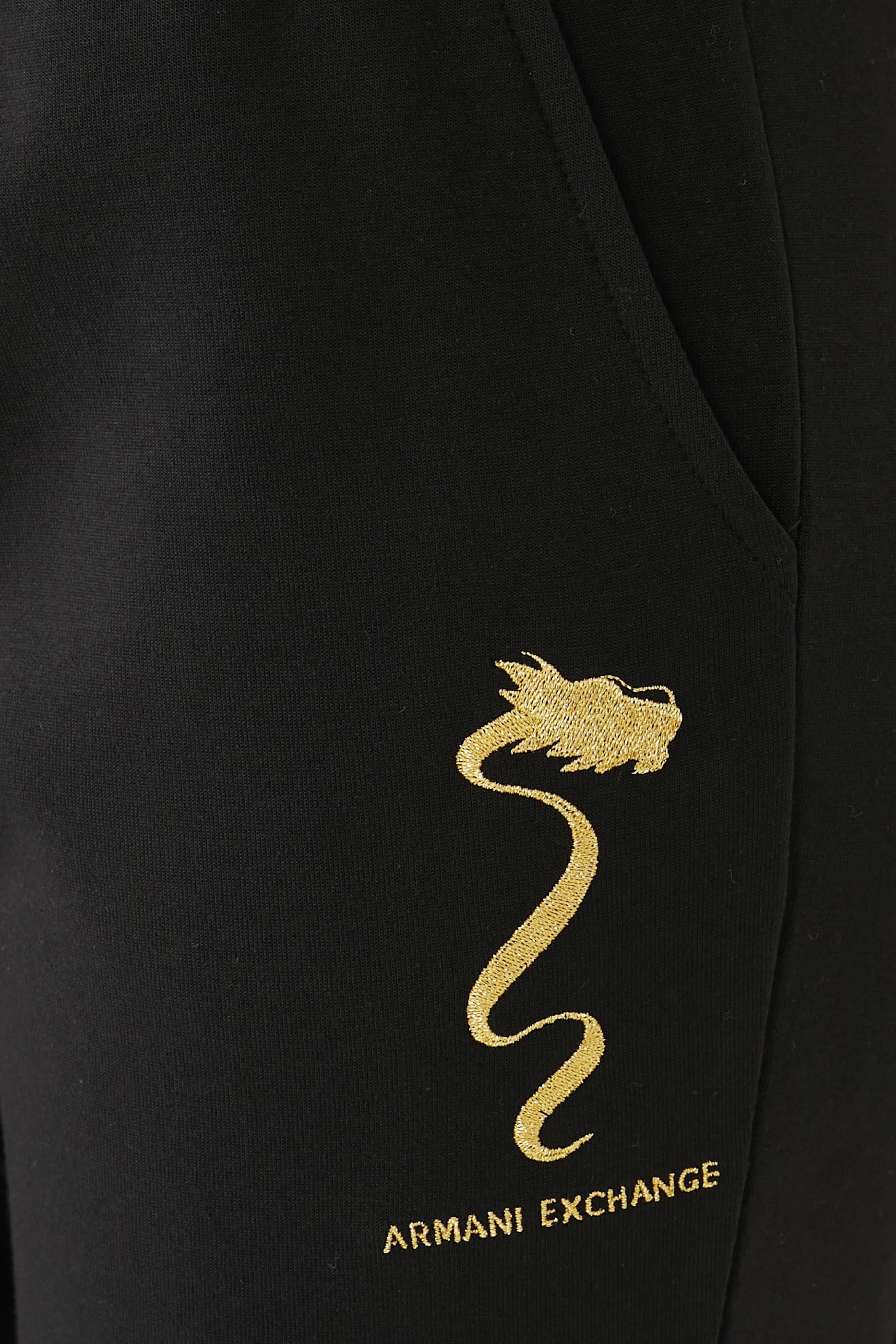 بنطال رياضي بحروف شعار الماركة بإصدار للسنة الصينية الجديدة