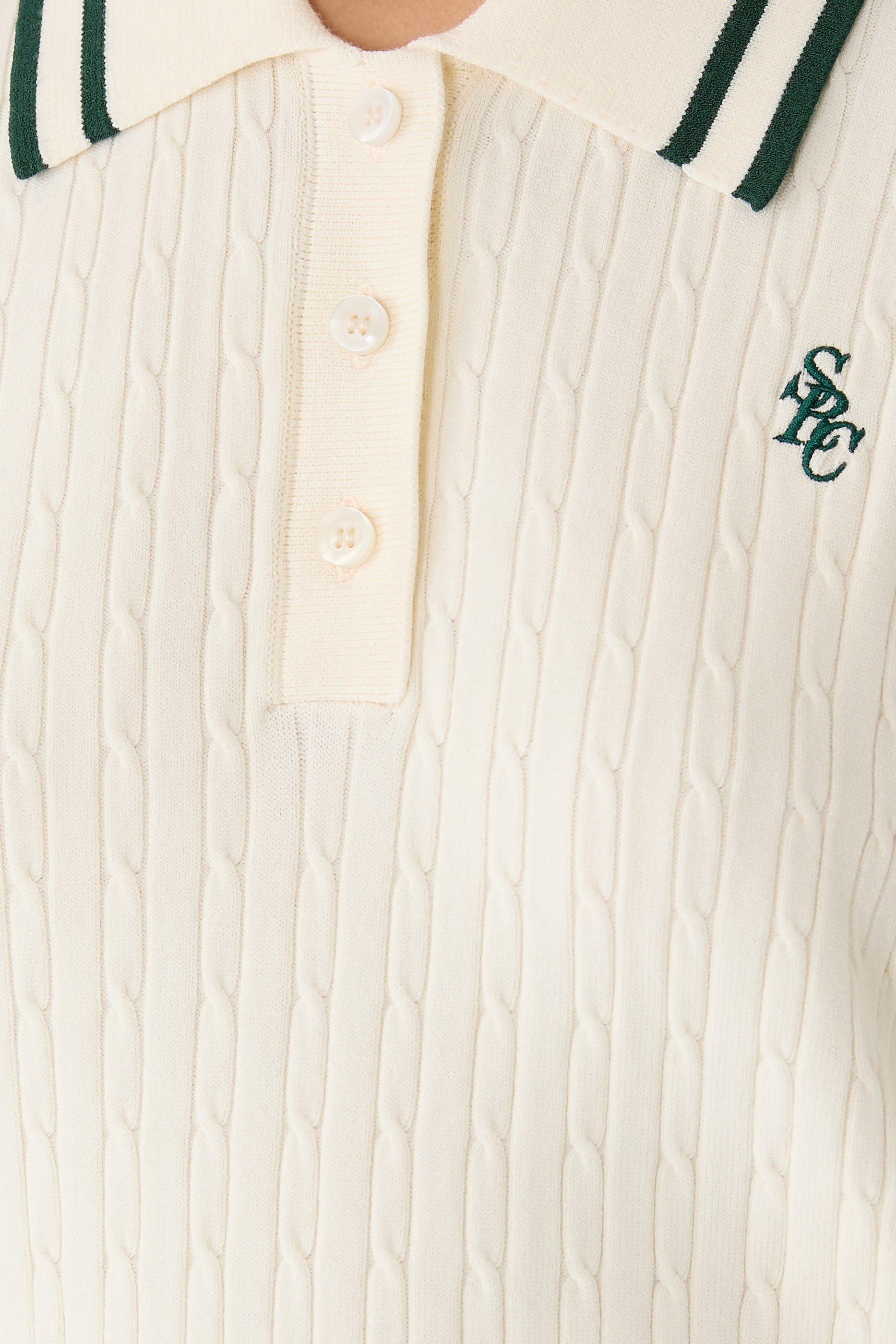 قميص بولو بشعار الماركة نسيج بغرزة ضفيرة صغيرة