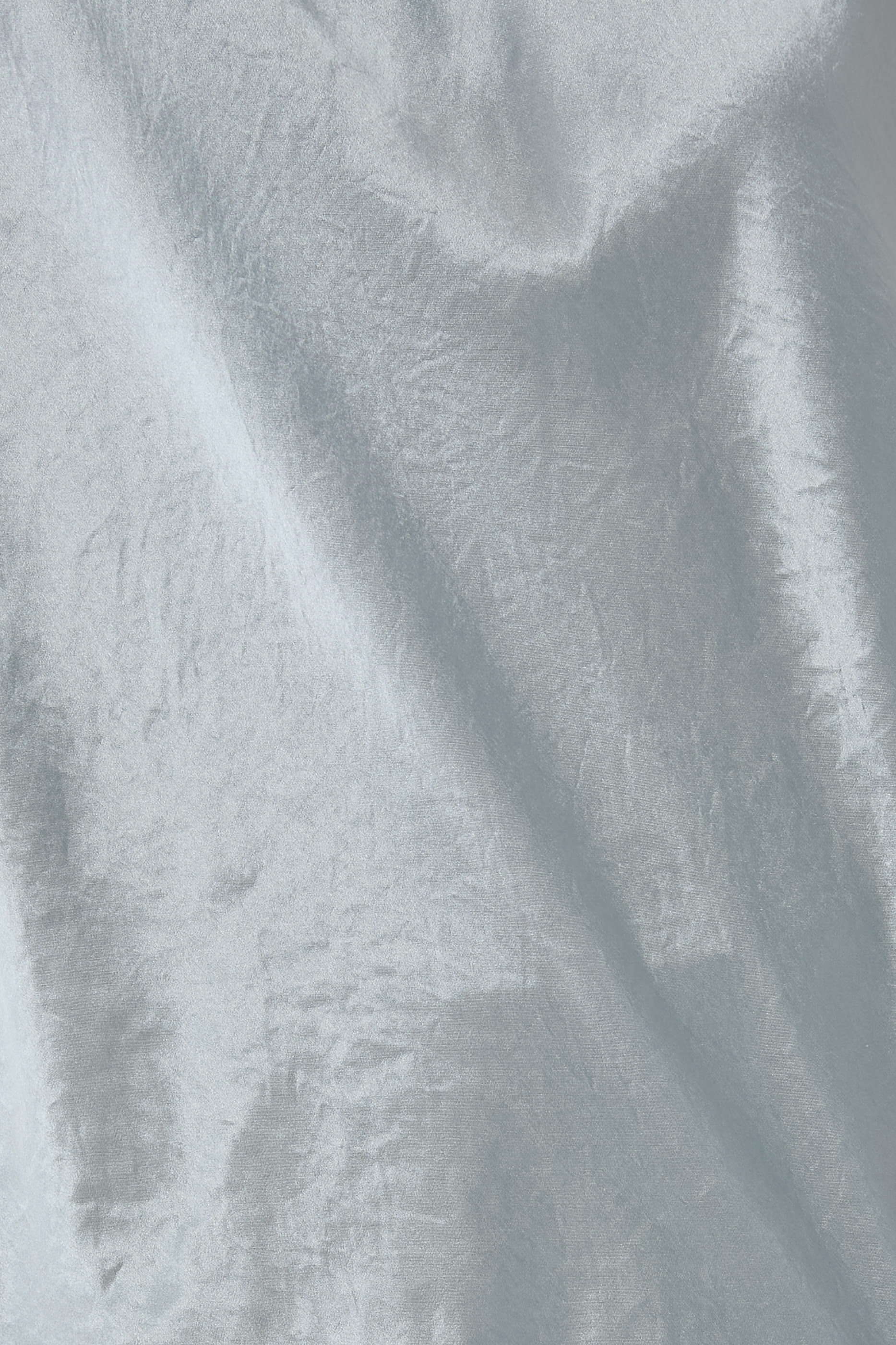 بلوزة بلا أكمام بتفاصيل صدفية