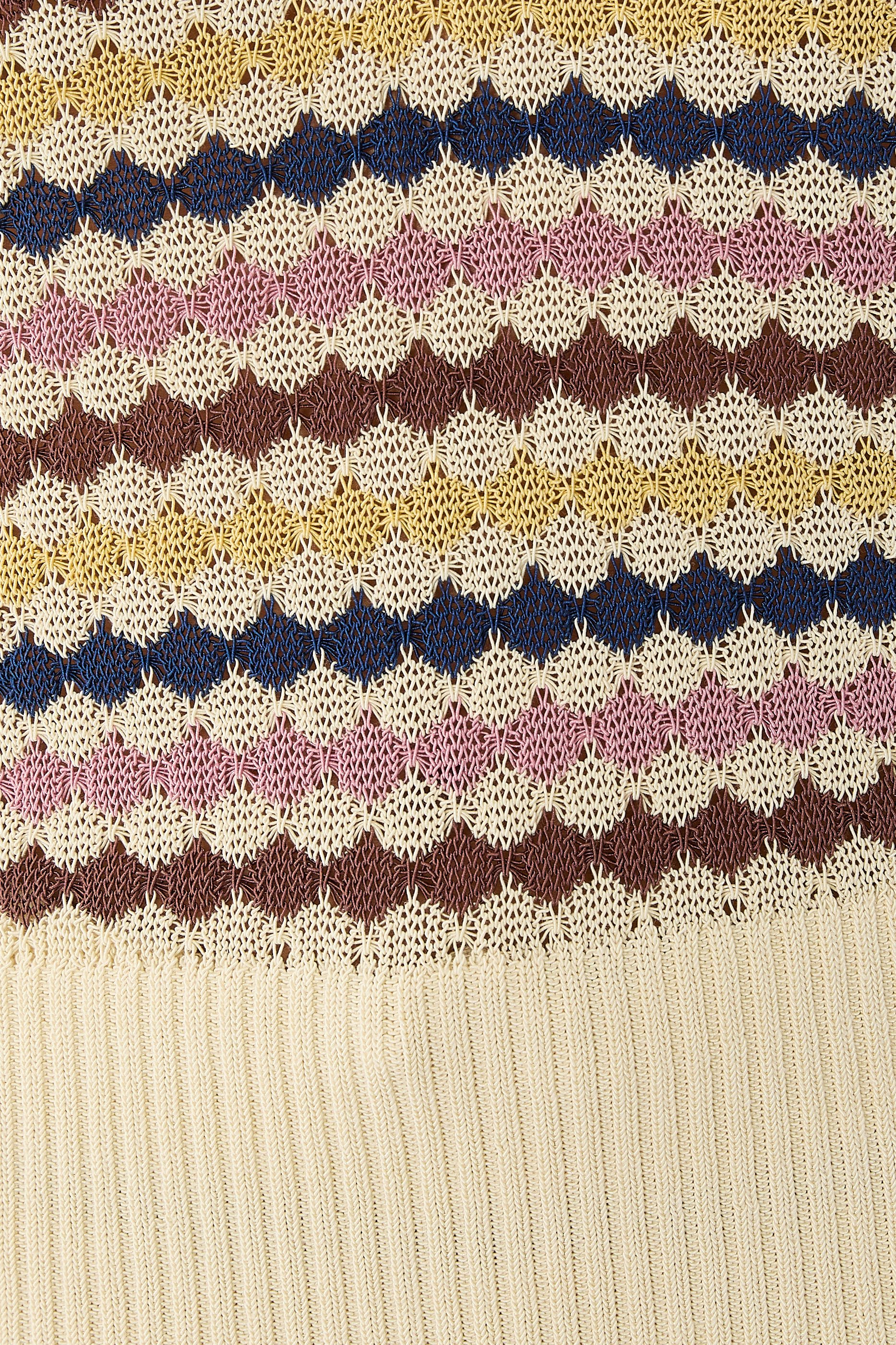 قميص بولو أوايكن منسوج بتفاصيل صدفية