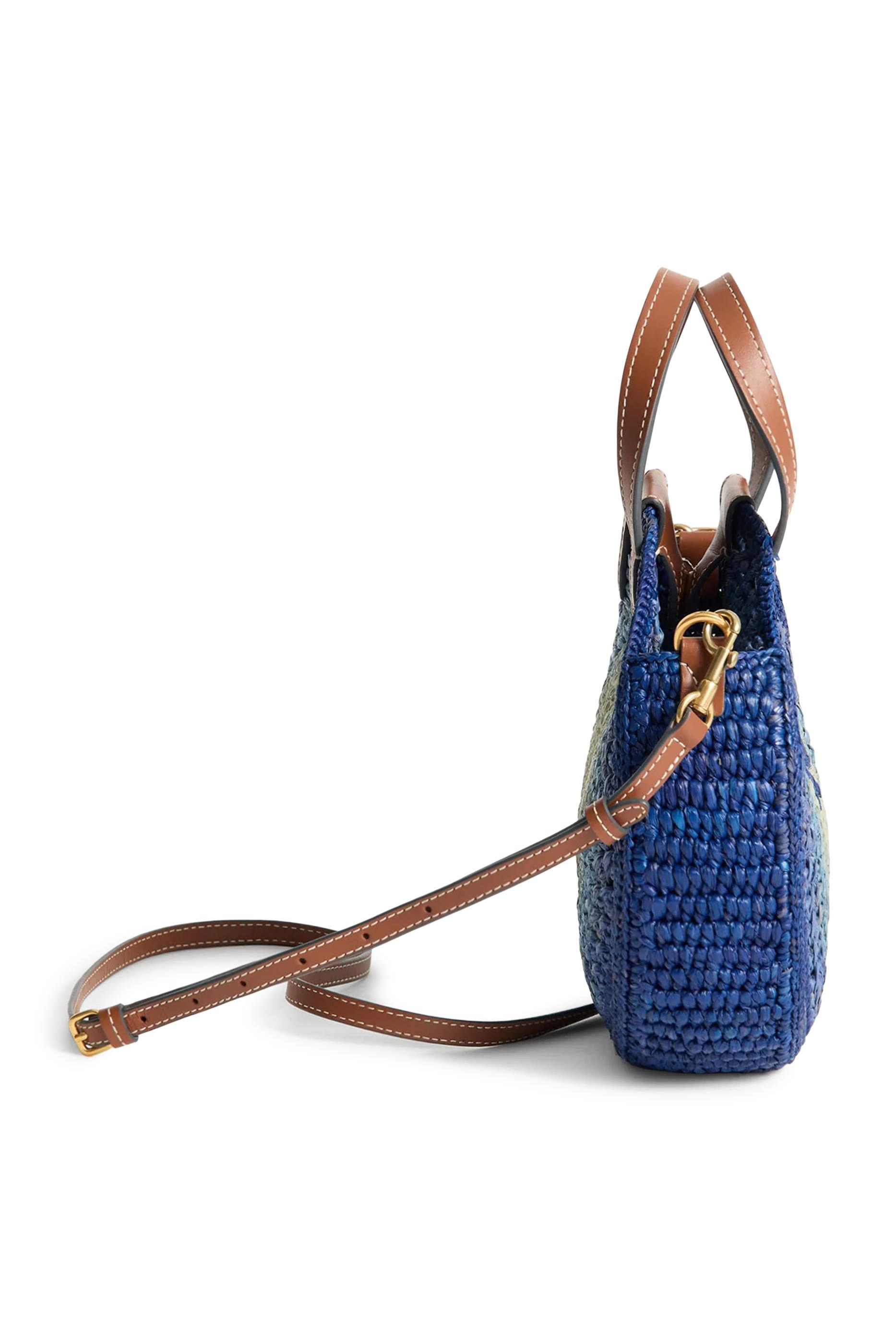 حقيبة يد صغيرة بتصميم مستدير بفيونكة مطرزة خوص