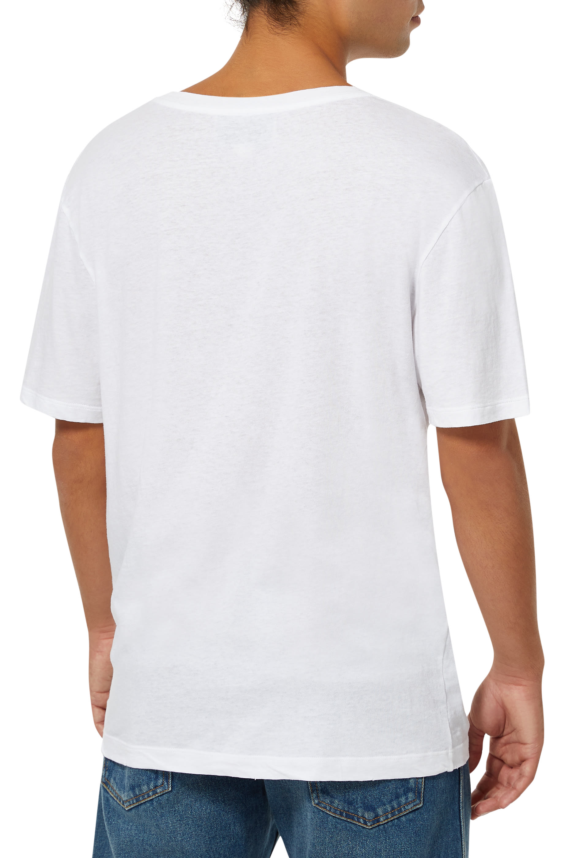 تي شيرت بقصة فضفاضة وشعار غوتشي بلون باهت