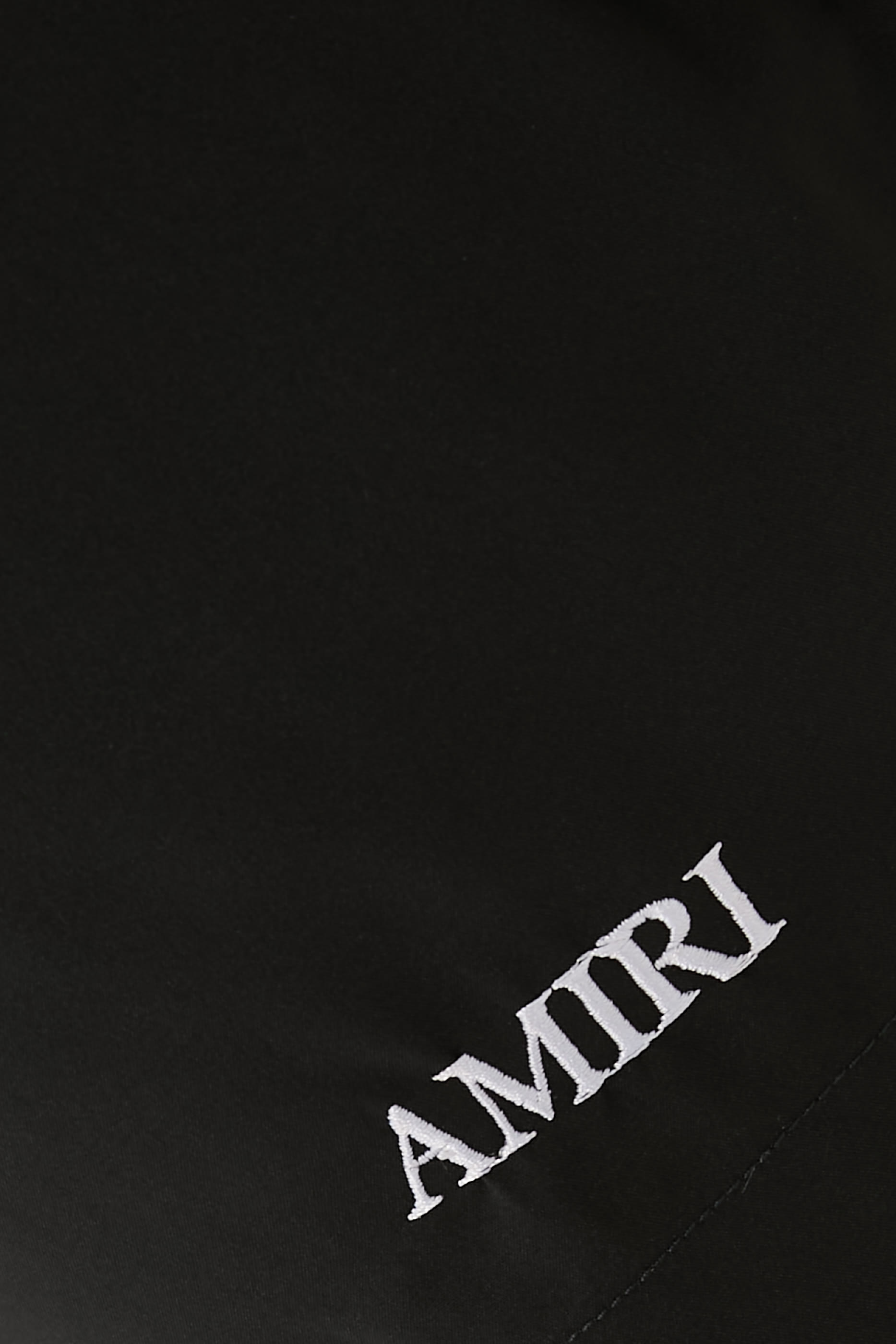 شورت سباحة بشعار الماركة