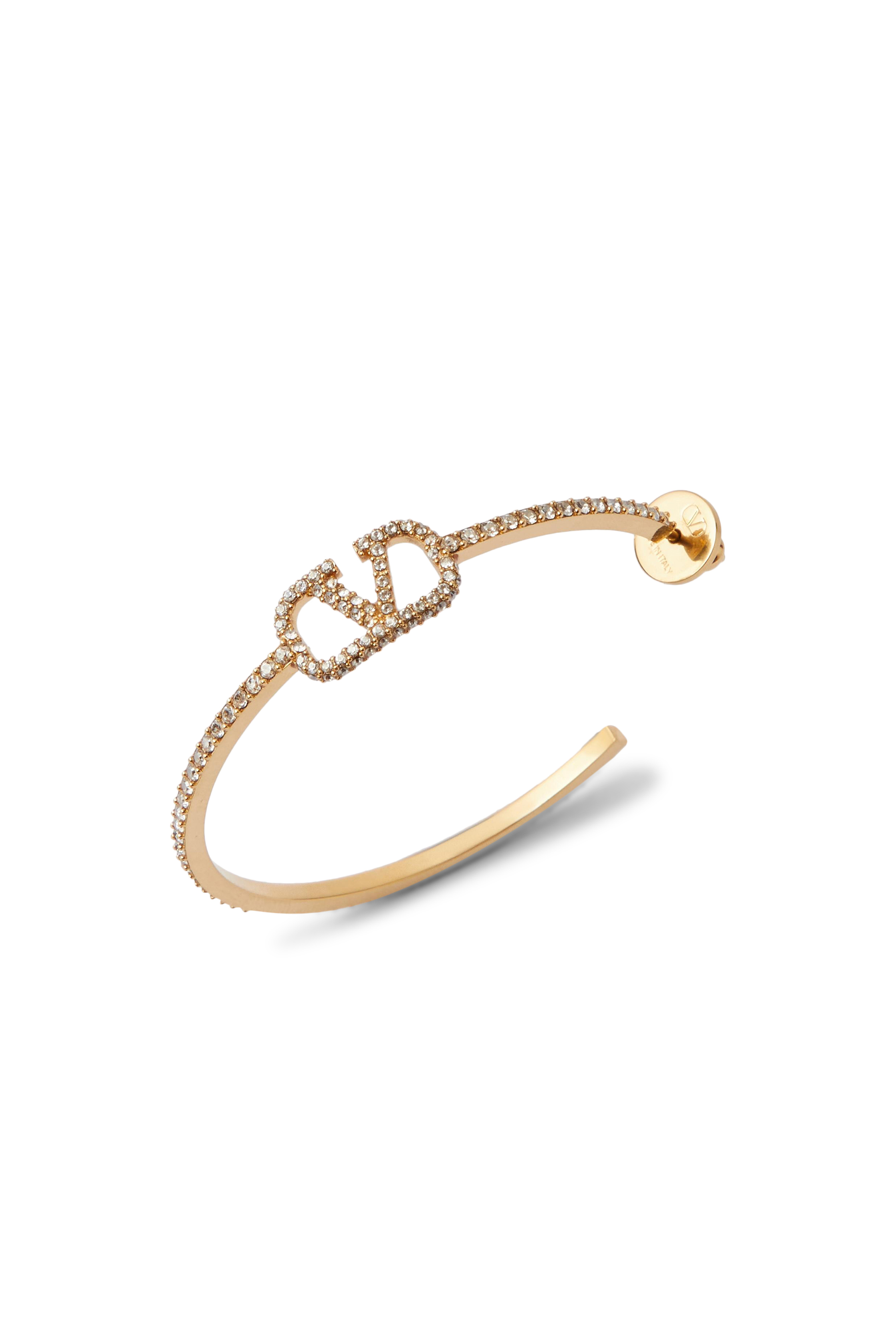 أقراط نصف دائرية بشعار V