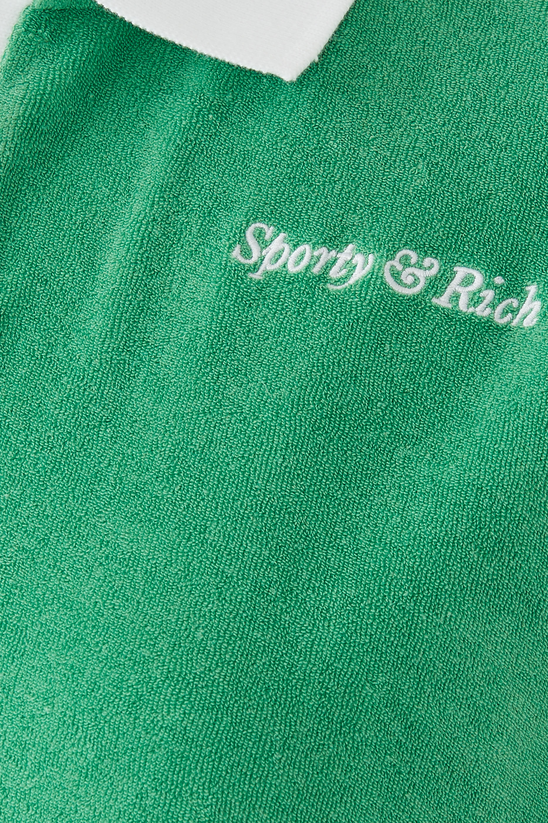 قميص بولو بشعار الماركة بتصميم مائل تيري