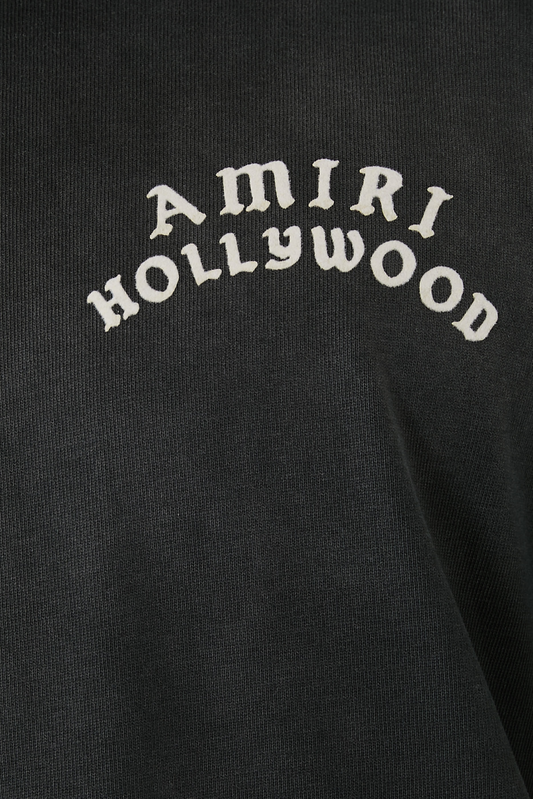 تيشيرت بقصة فضفاضة مزين بشعار الماركة وهوليوود