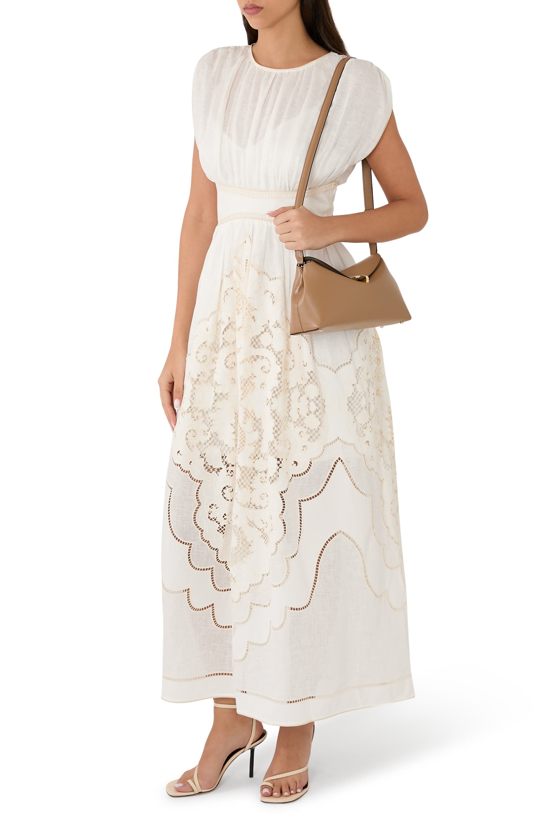 حقيبة كلاتش بقفل على شكل حرف T