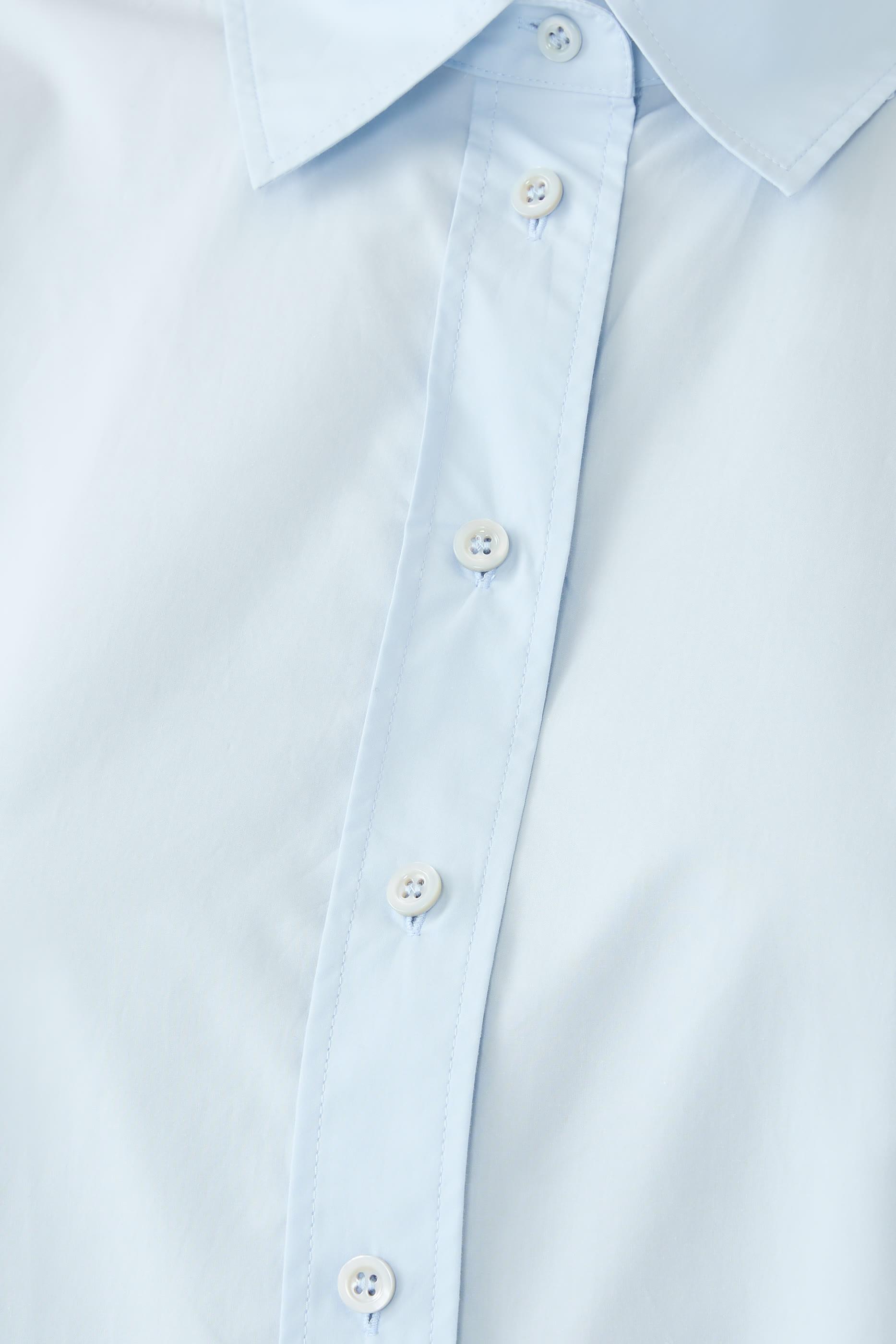 قميص بقصة فضفاضة