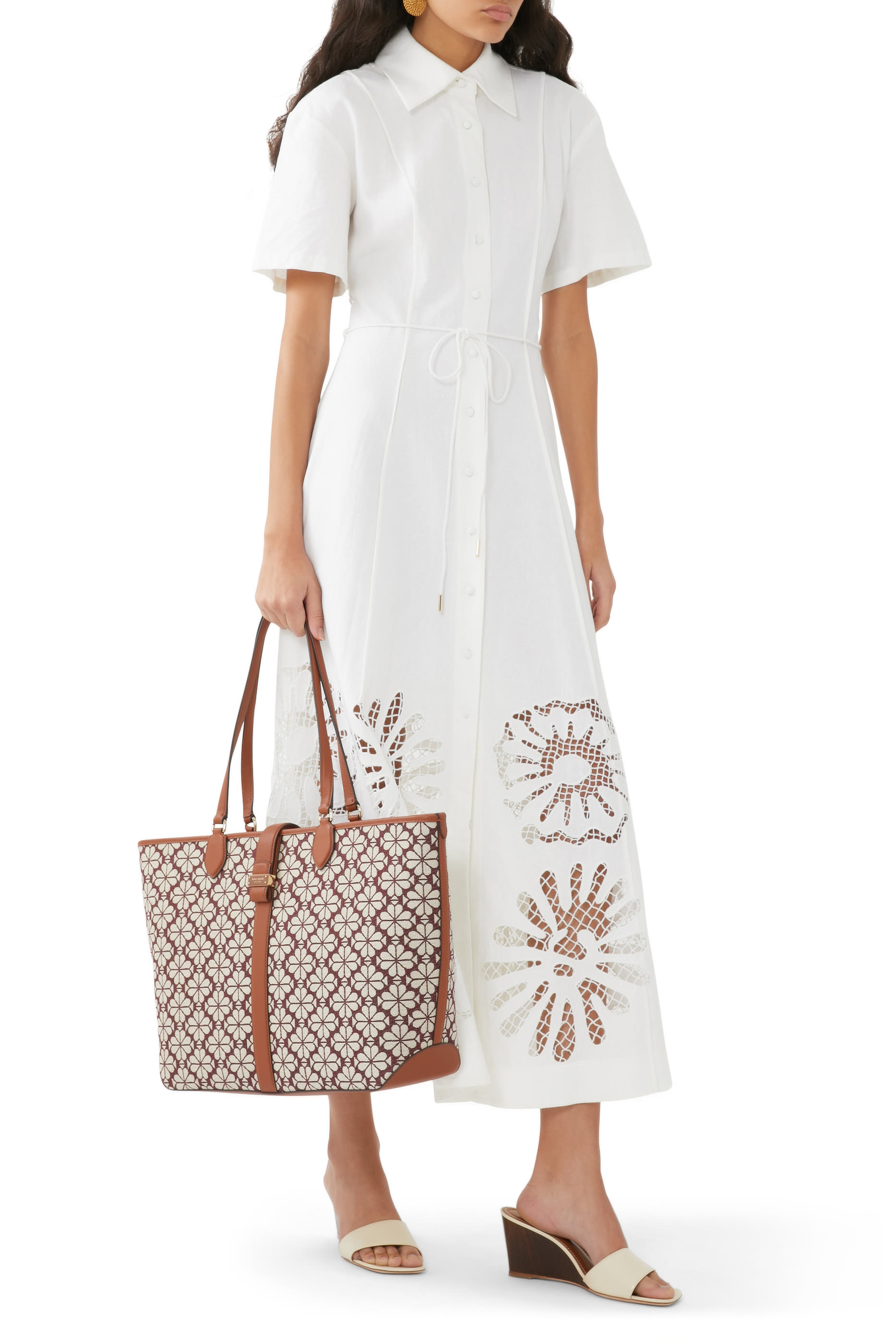 حقيبة يد قنب مطلي بنقشة زهور بالشكل البستوني