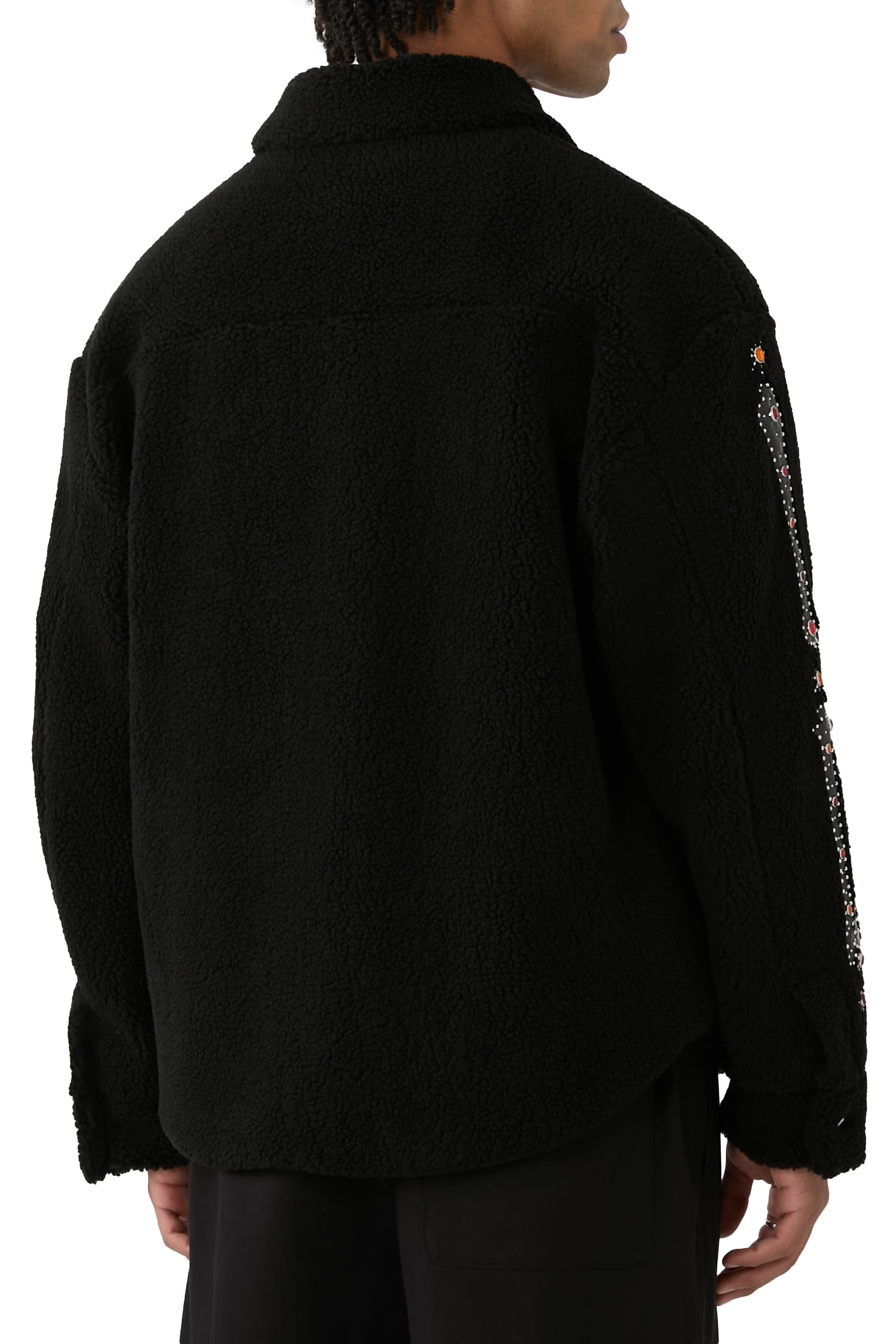 سترة مزينة بأحجار ورقع هيكل عظمي