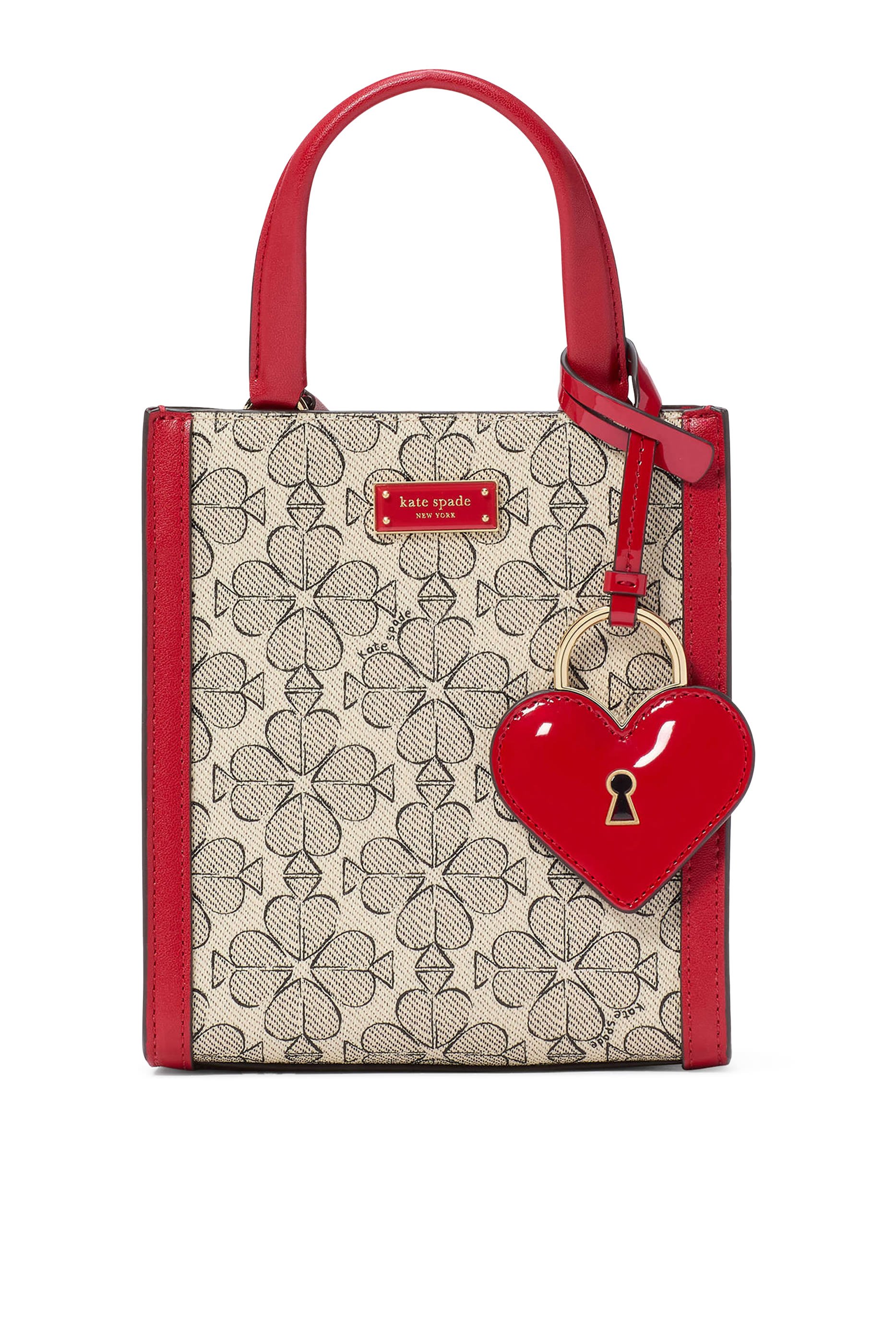 حقيبة يد صغيرة بنقشة زهور بالشكل البستوني