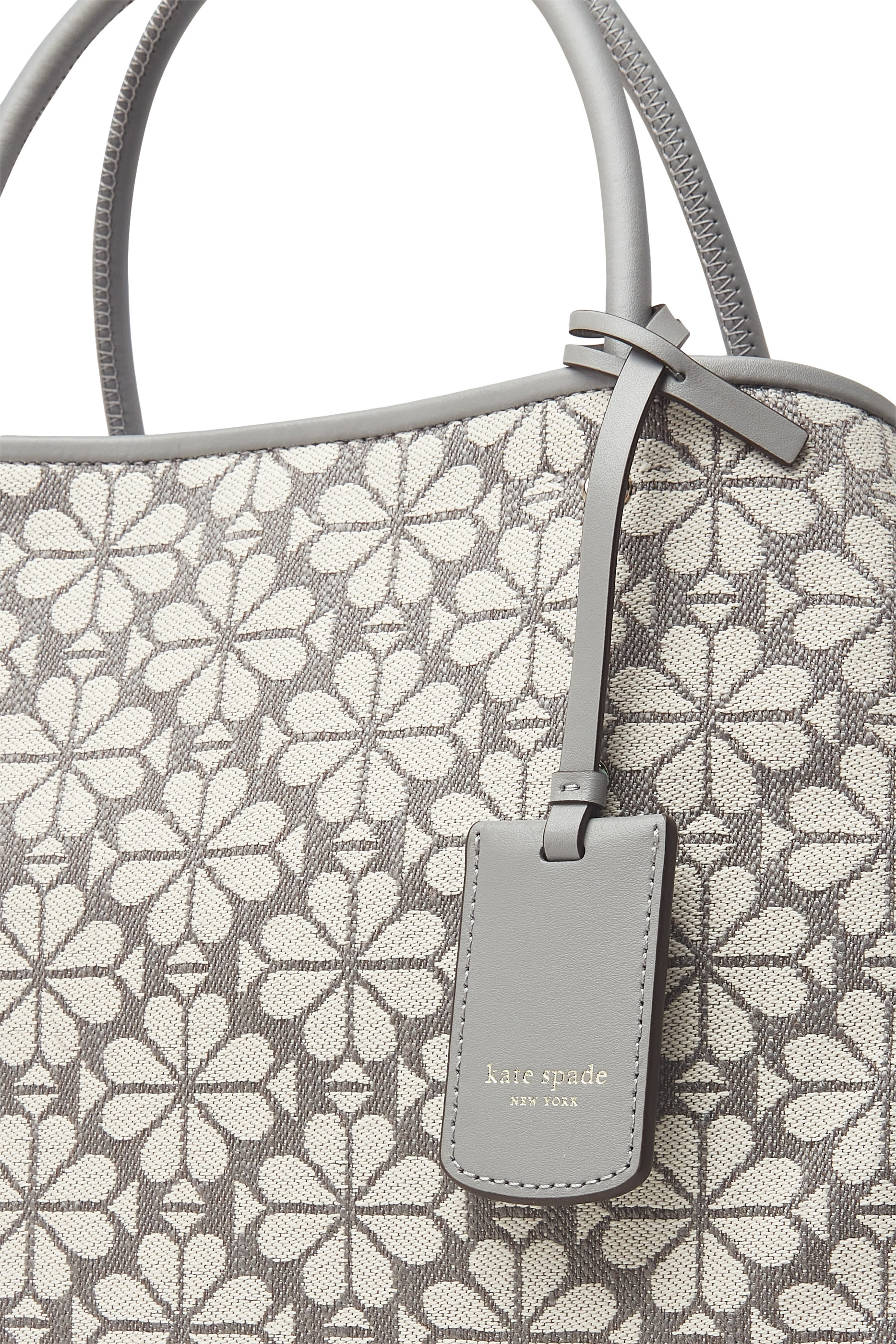 حقيبة يد متوسطة بنقشة زهور بالشكل البستوني