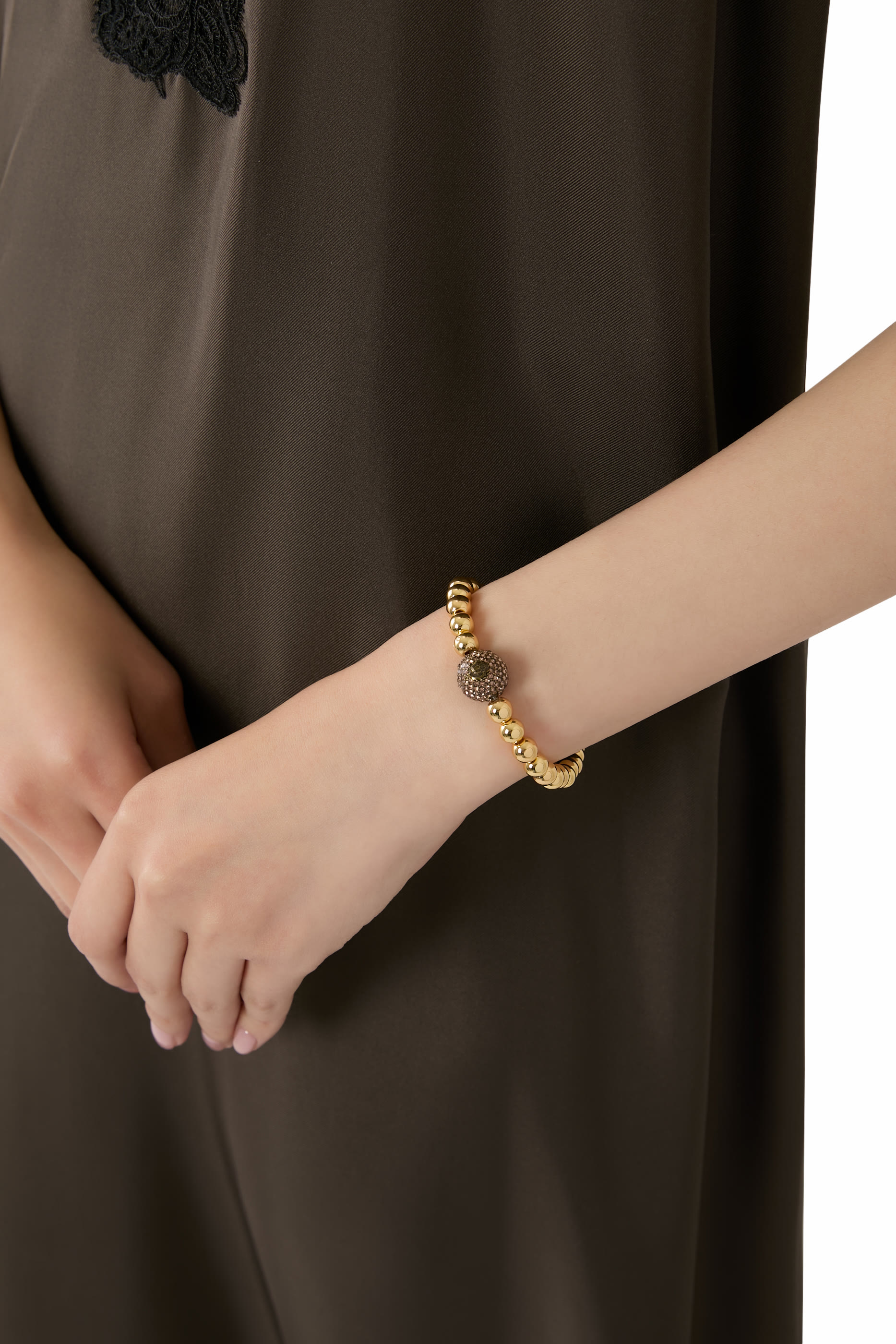 سوار مزين بخرز وحلية رأس النسر