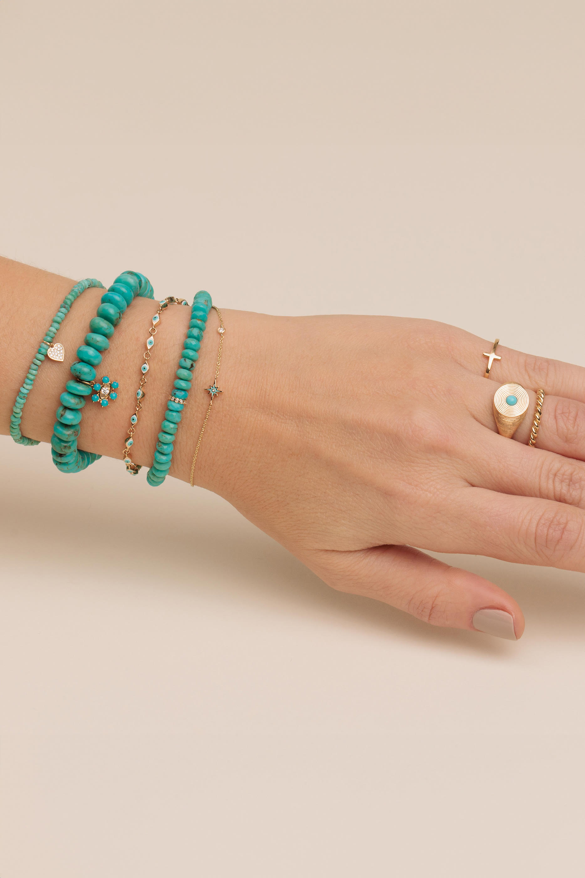 سوار مزين بحلي عين حسود صغيرة ذهب أصفر عيار 14