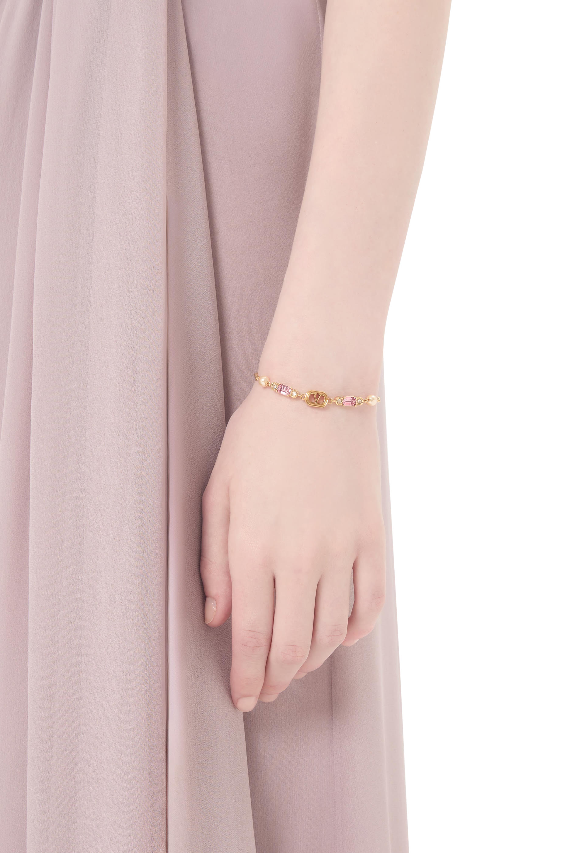 سوار بأحجار وحلية بتصميم بيضاوي