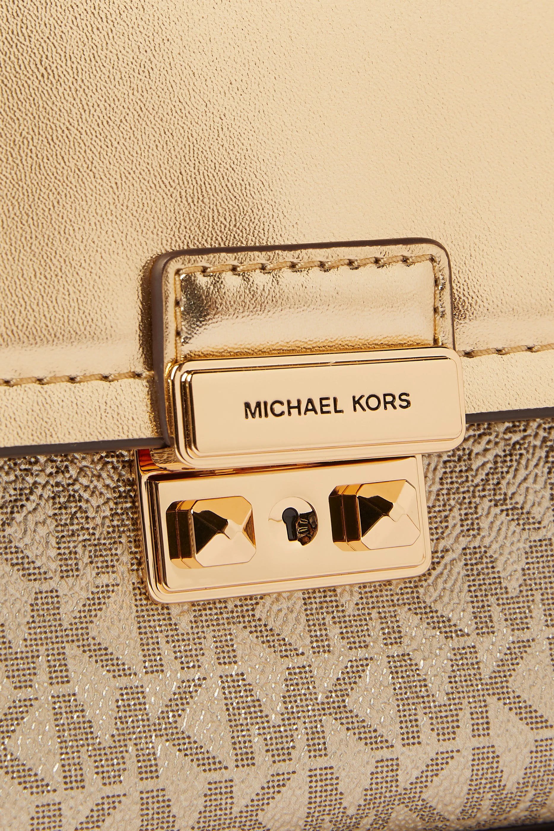 حقيبة كروس بودي تريبيكا قابلة للتحويل صغيرة جدًا بشعار