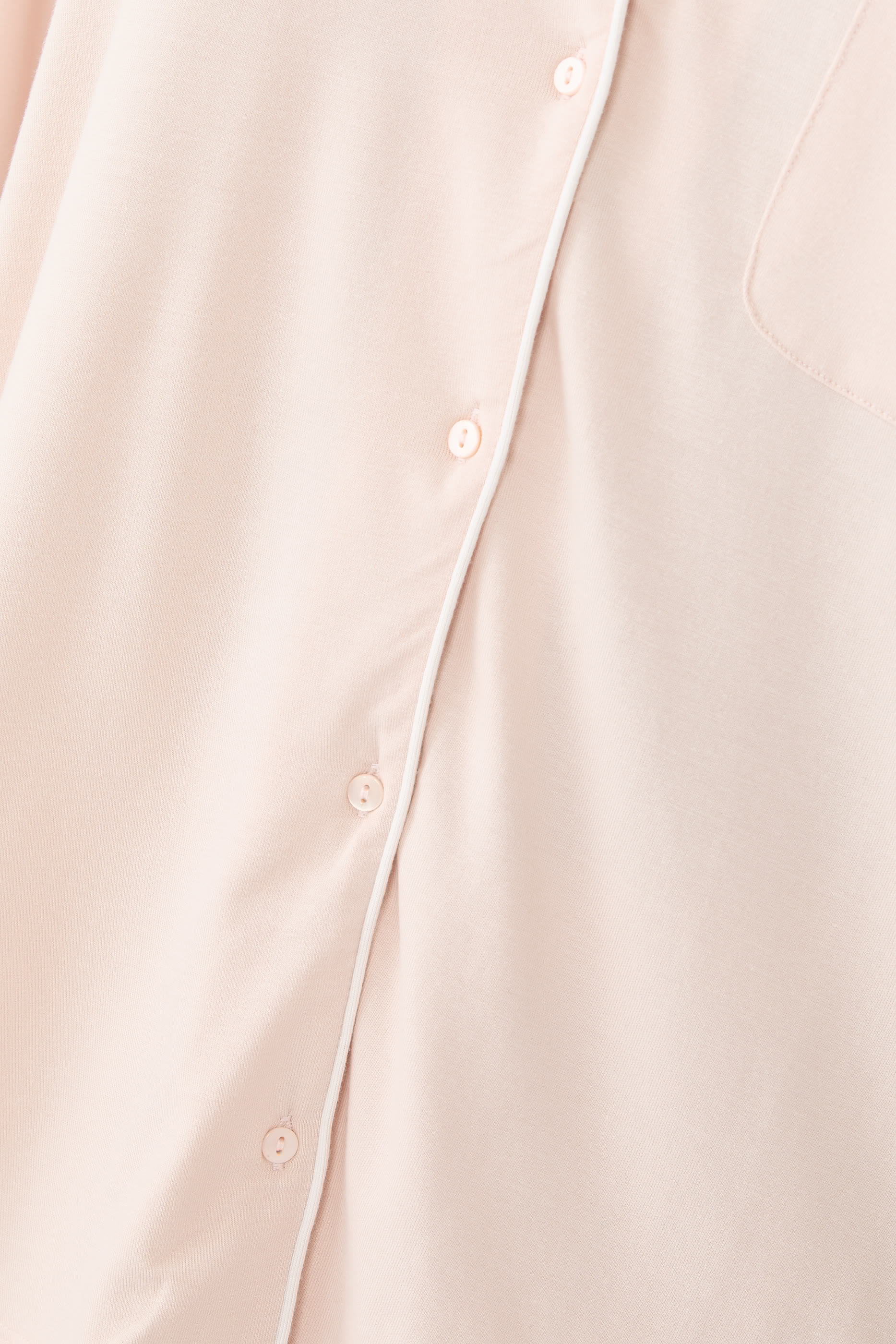 طقم بيجامة بقصة مريحة وحواف ملفوفة بلون مغاير جيرسيه