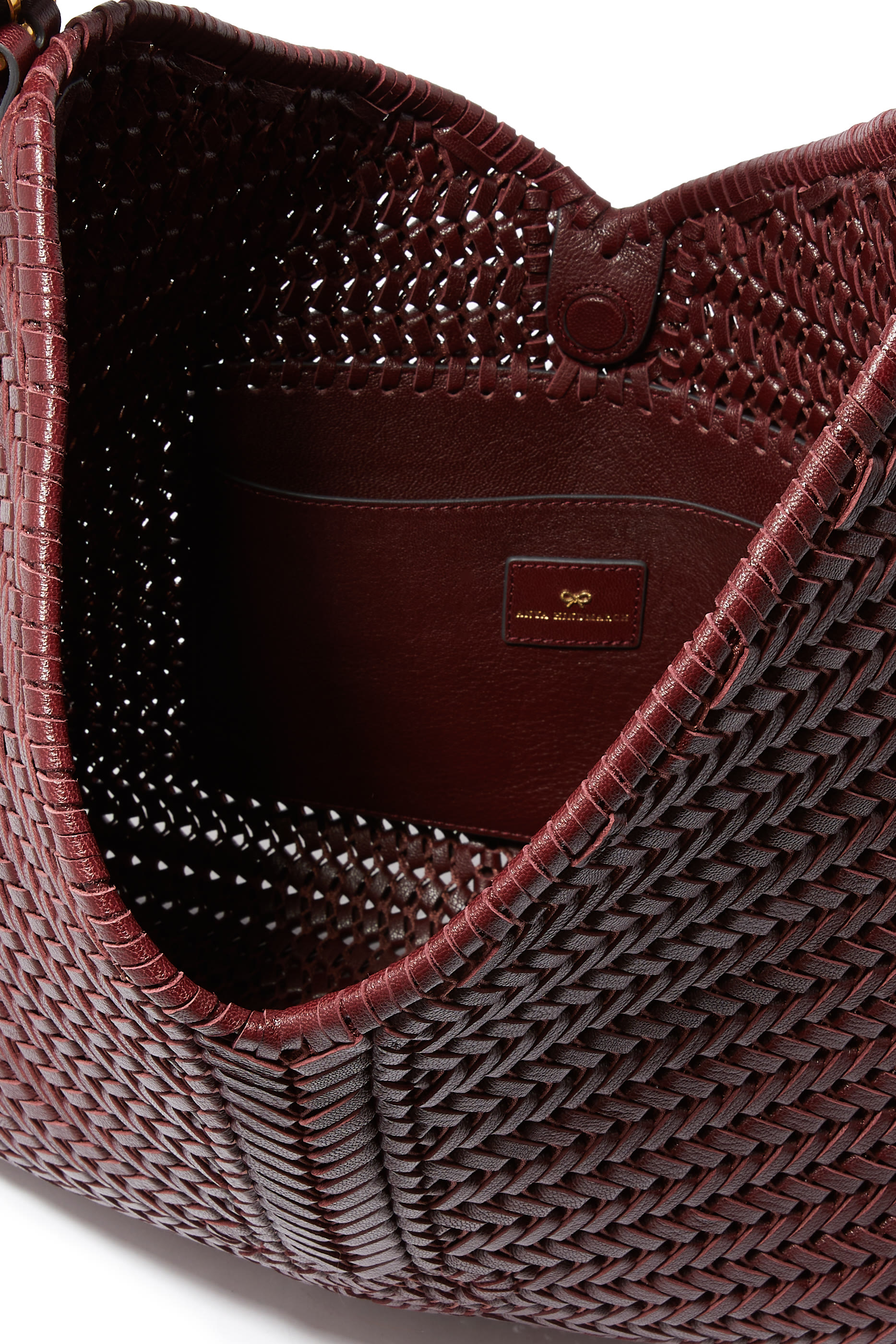 حقيبة هوبو نيسون مزينة بشرابات