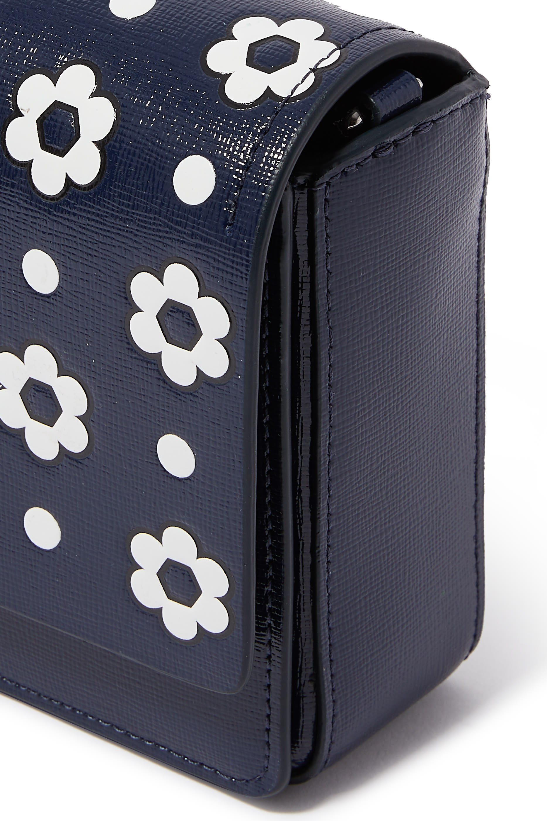 حقيبة كروس بودي مورغان بغطاء قلاب مع سلسلة ونقشة زهور أقحوان ونقاط