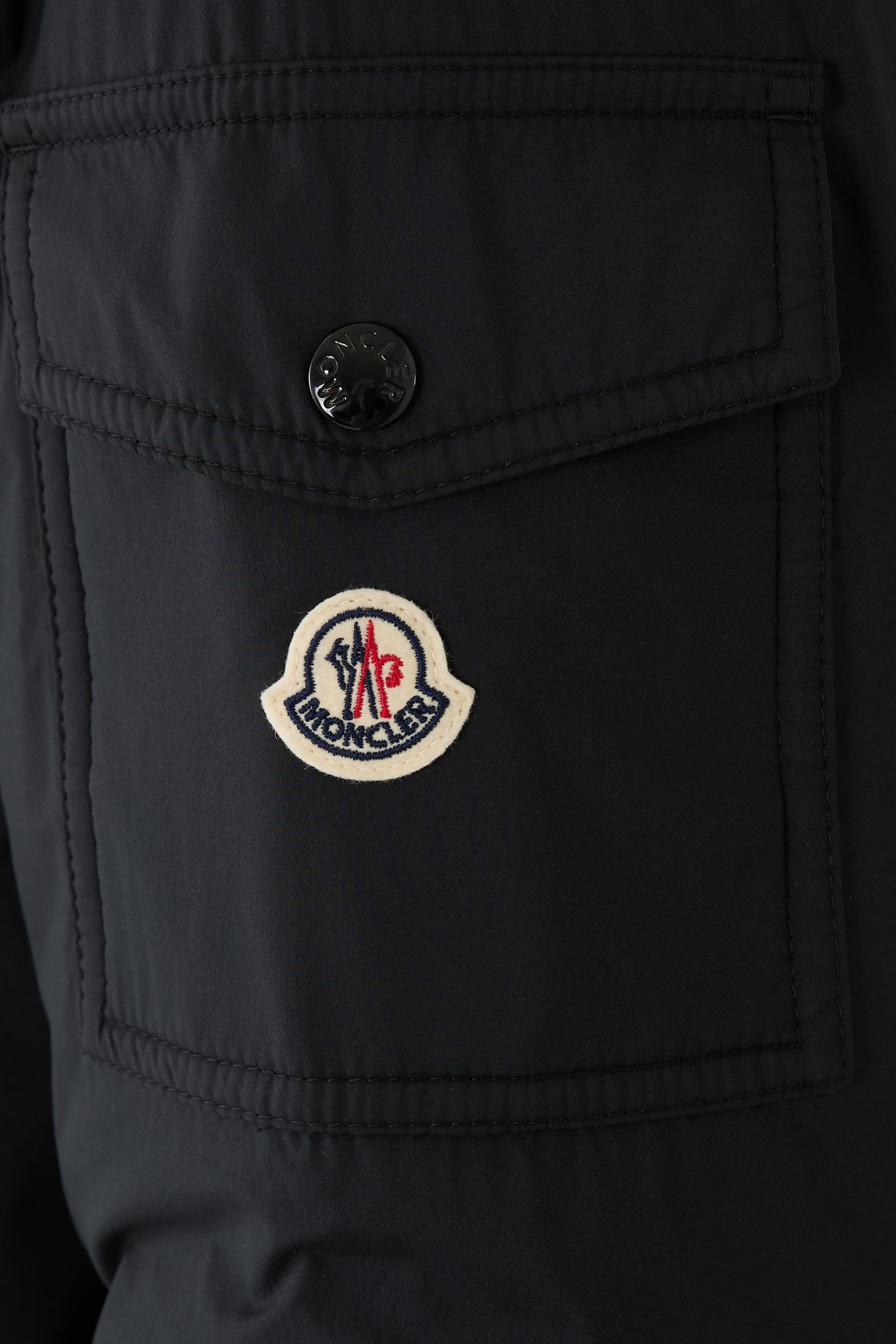 جاكيت مونتينار قصير بغطاء رأس وتصميم مبطن بالزغب